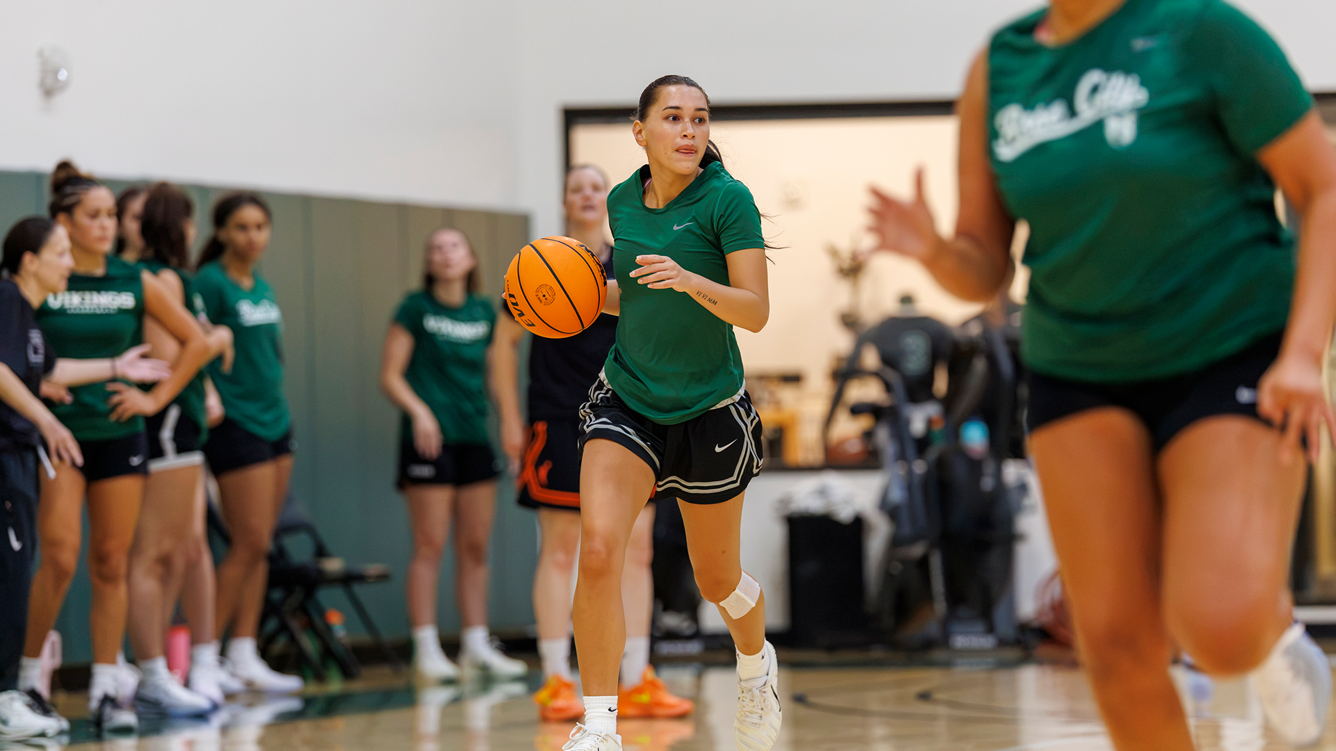 Portland State women's basketball player Laynee Torres-Kahapea brings the ball up the floor during a team practice.