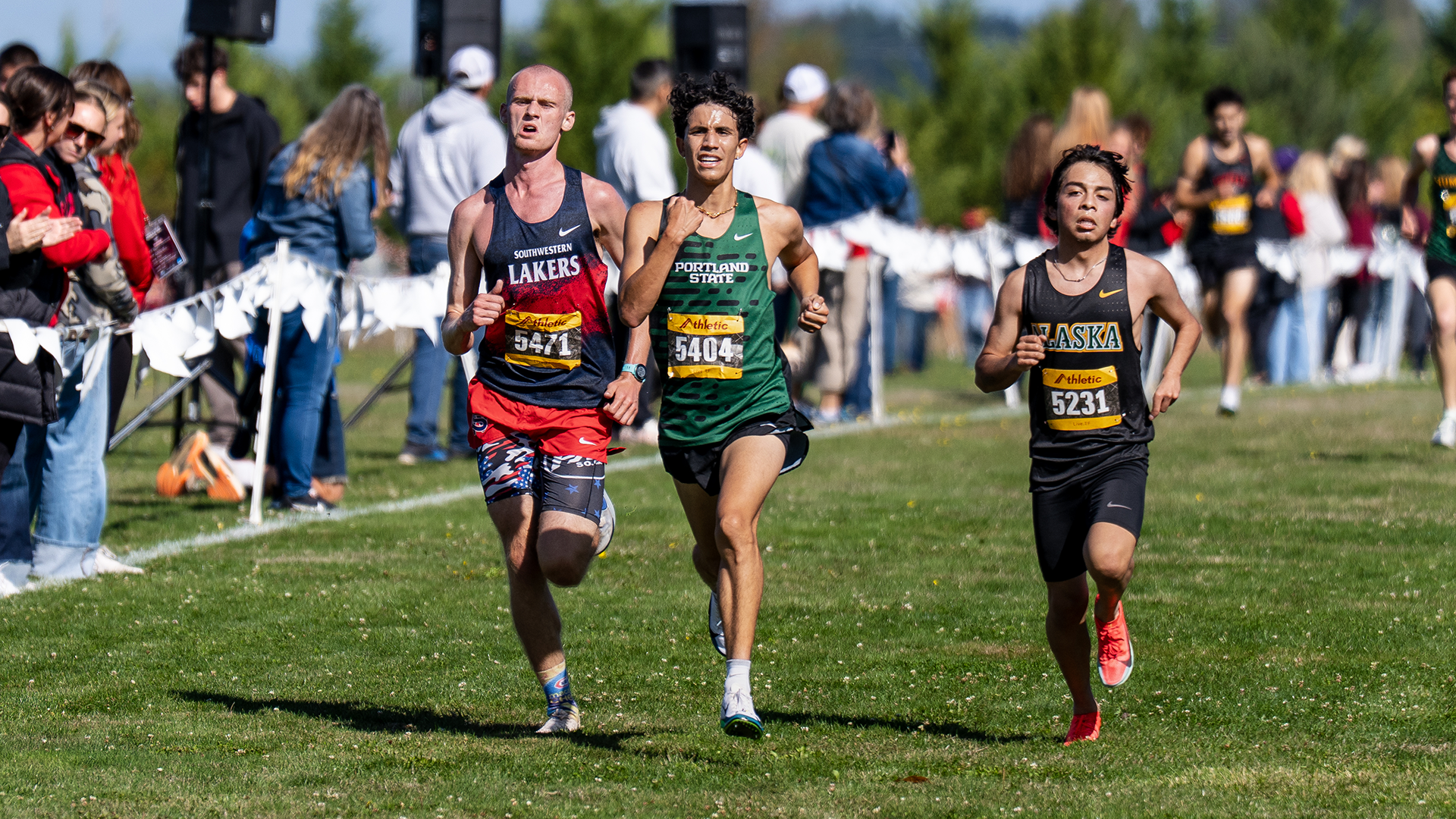 Portland State cross country runner Vince Estrada kicks to the finish line at the Mike Johnson Classic. 
