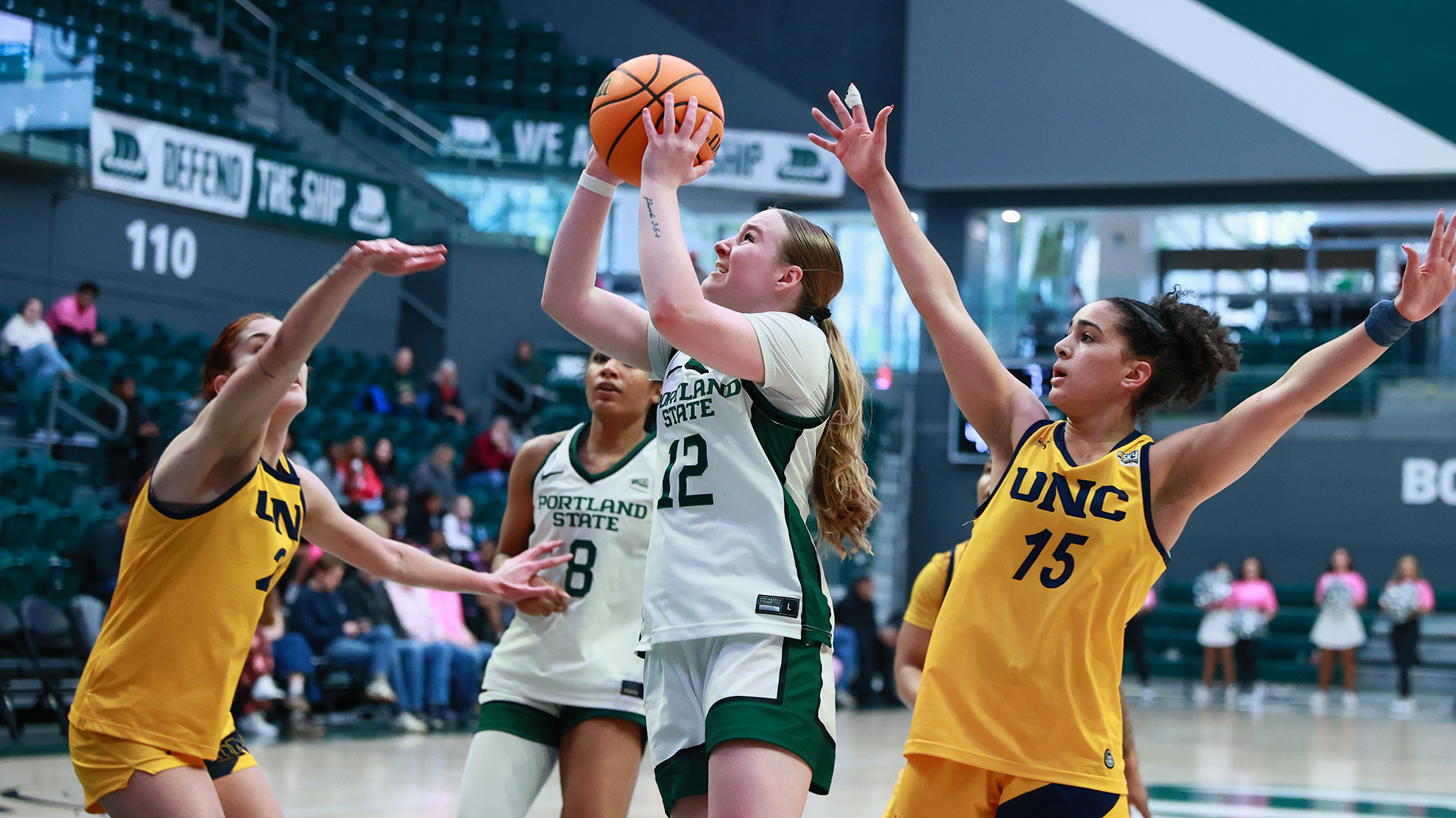 Portland State women's basketball player Kyleigh Brown goes up for a contested layup in the Vikings' home game against Northern Colorado.