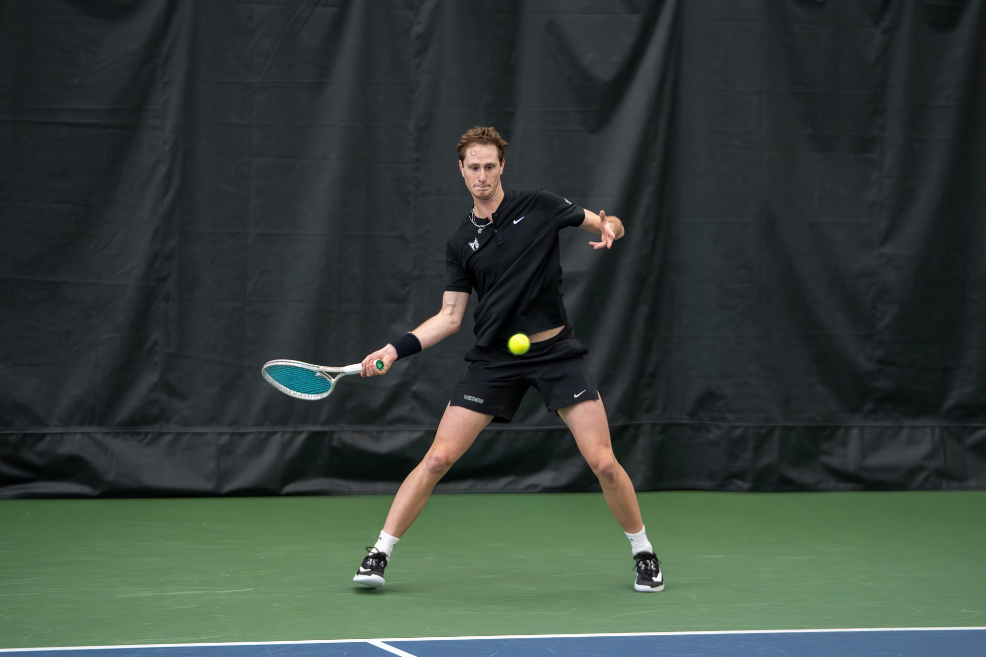 Photos from the Vikings' sweep of George Fox in their home opener at the Tualatin Hills Tennis Center on Jan. 31, 2026
