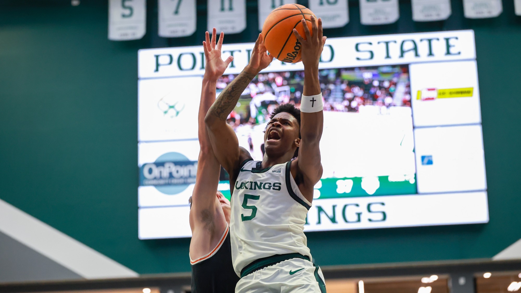 Jaylin Henderson goes inside against Idaho State