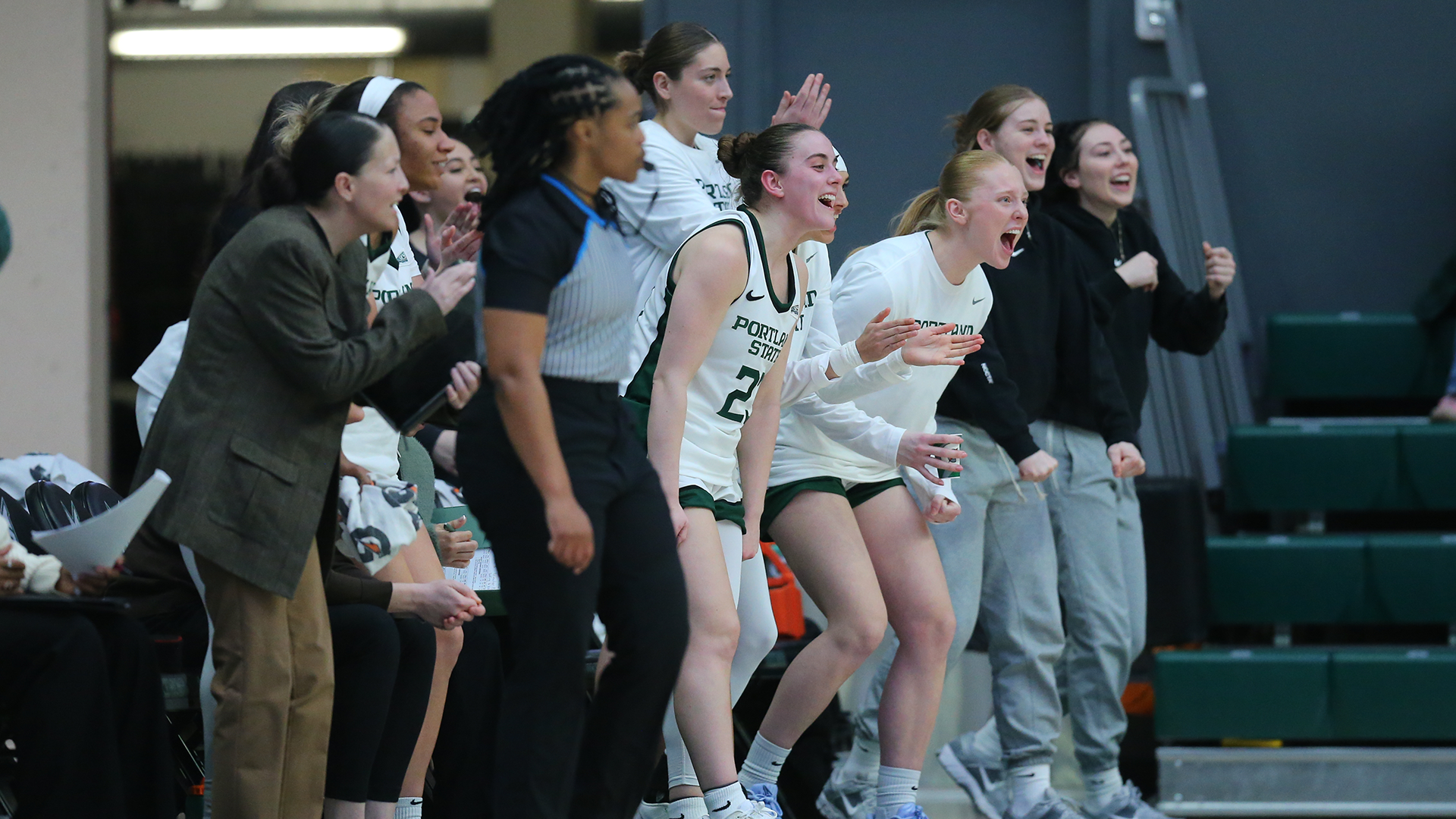 The Portland State women's basketball team's bench reacts to a play during the Vikings' home game against Montana State.