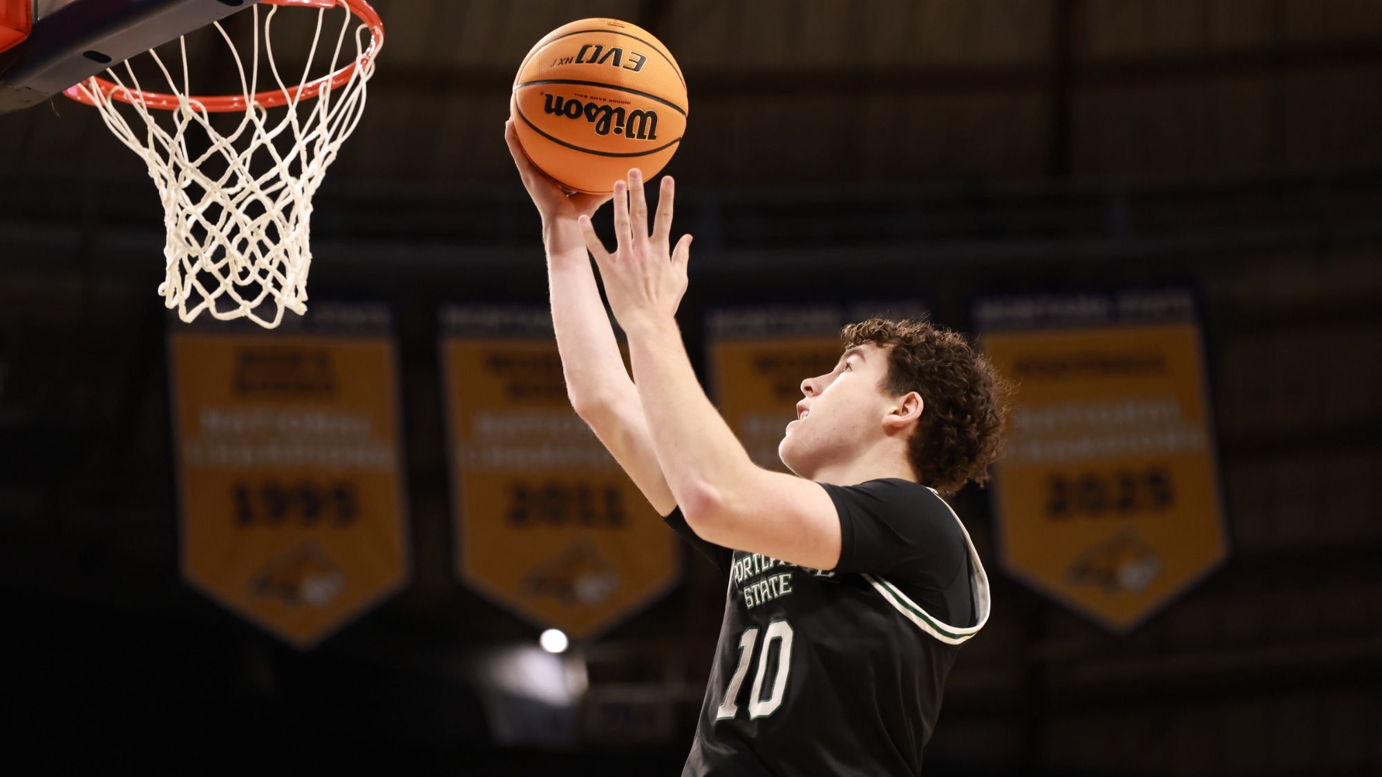 Colt Ness lays in the ball for two points at Montana State