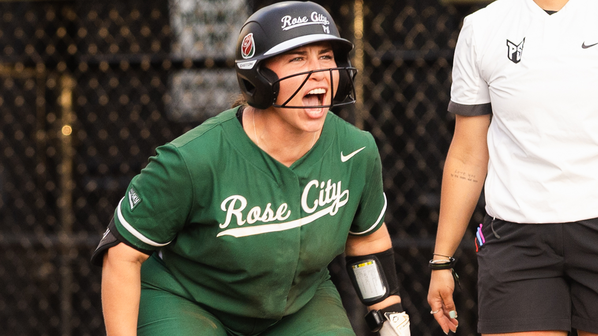Breanna Lutz celebrates RBI against Hawai'i
