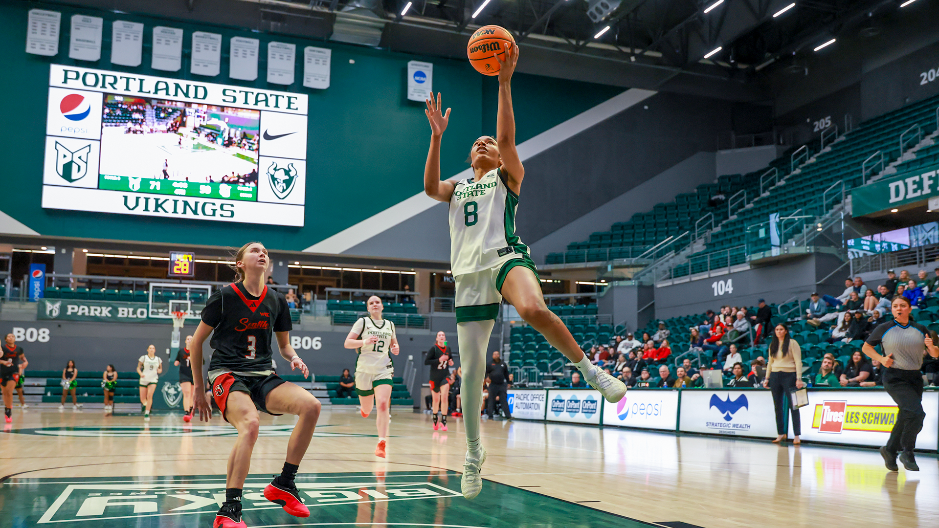 Portland State women's basketball player Cici Ellington goes up for a layup during the Vikings' home game against Seattle U.