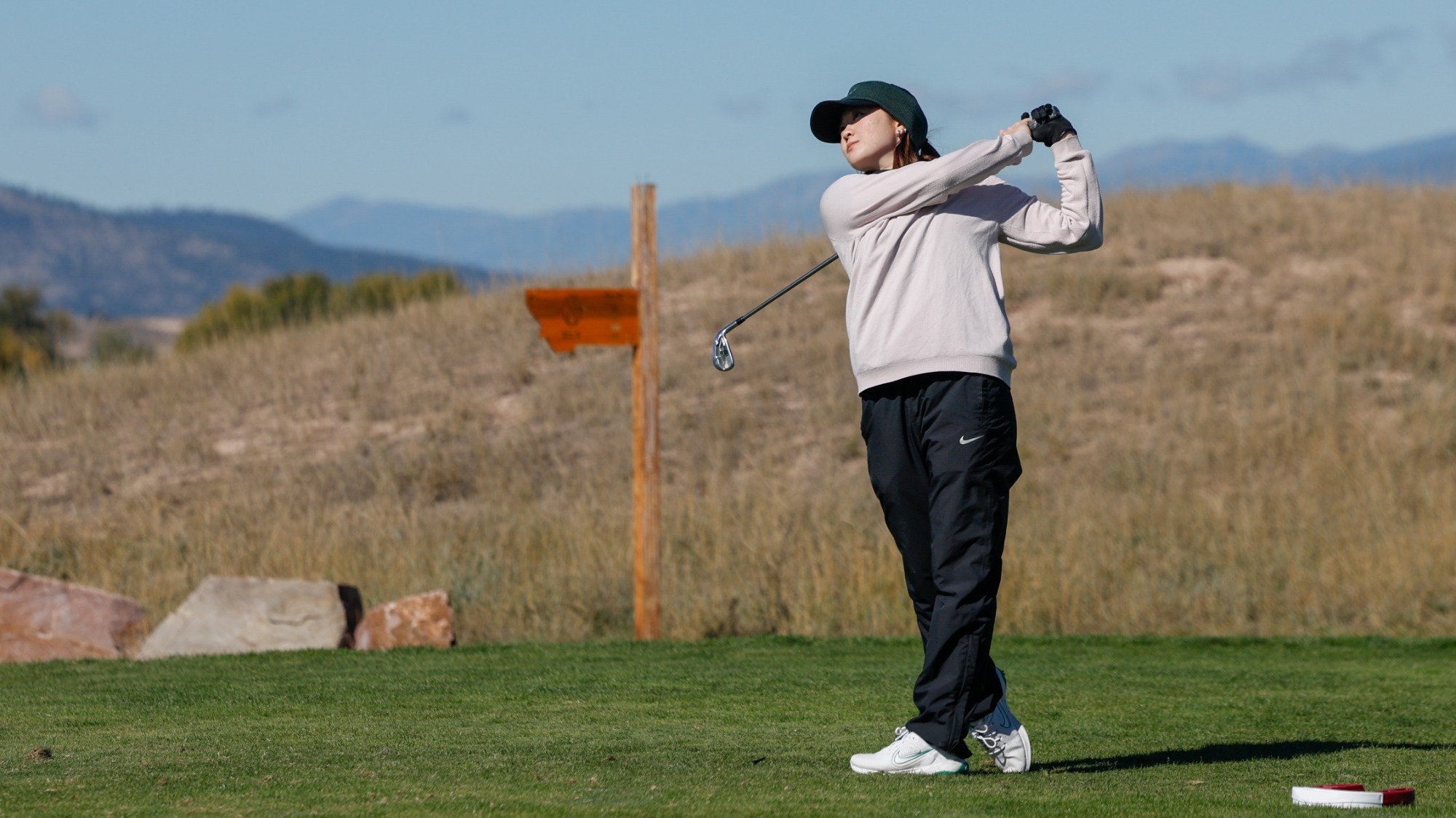Payten Shimizu tees off in a tournament in Montana