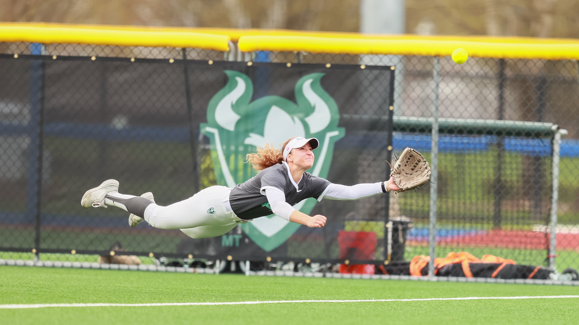Gracie Toney dives for a ball against Santa Clara 