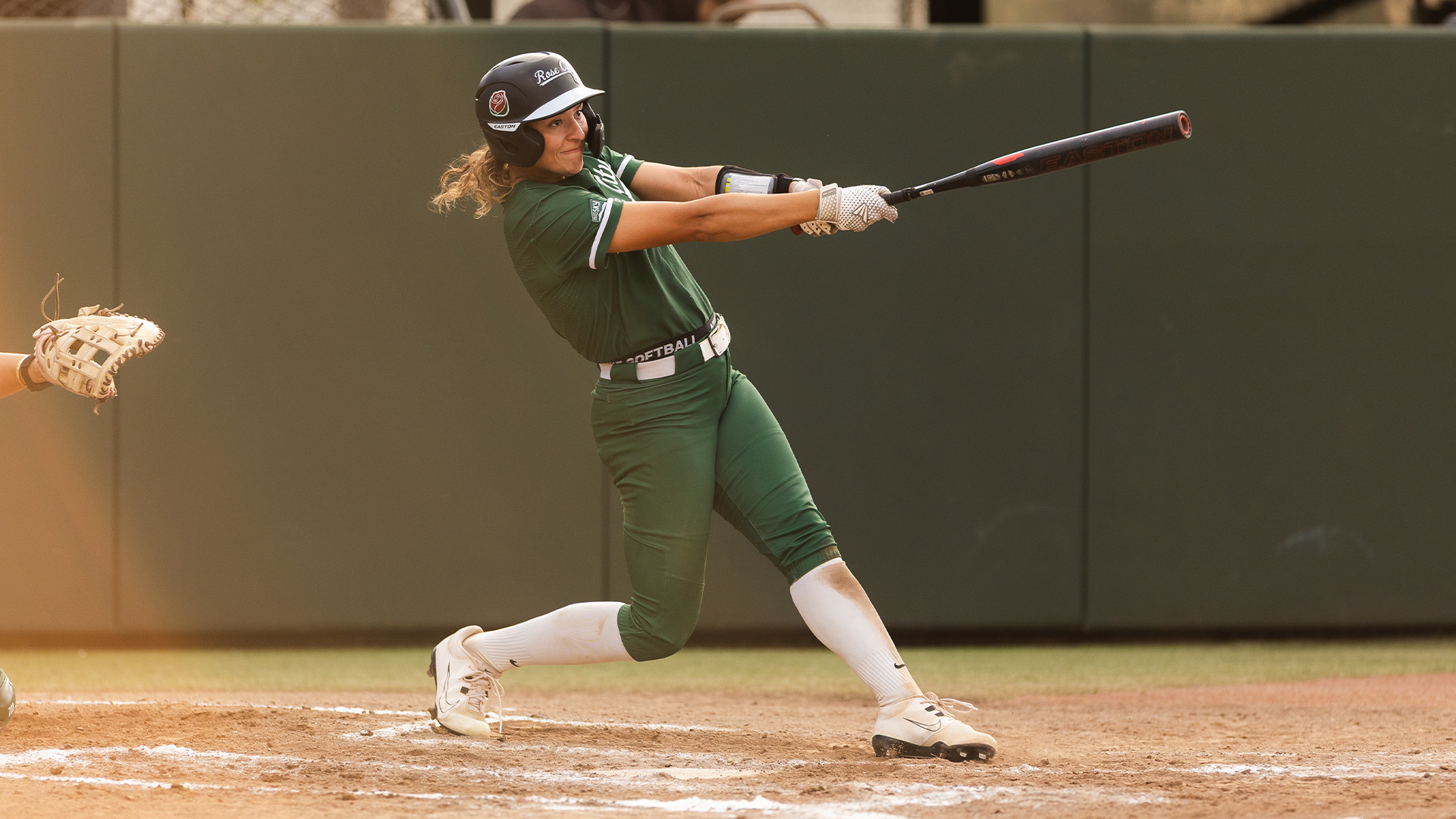 Abigail Carsley swings at a pitch against Hawai'i