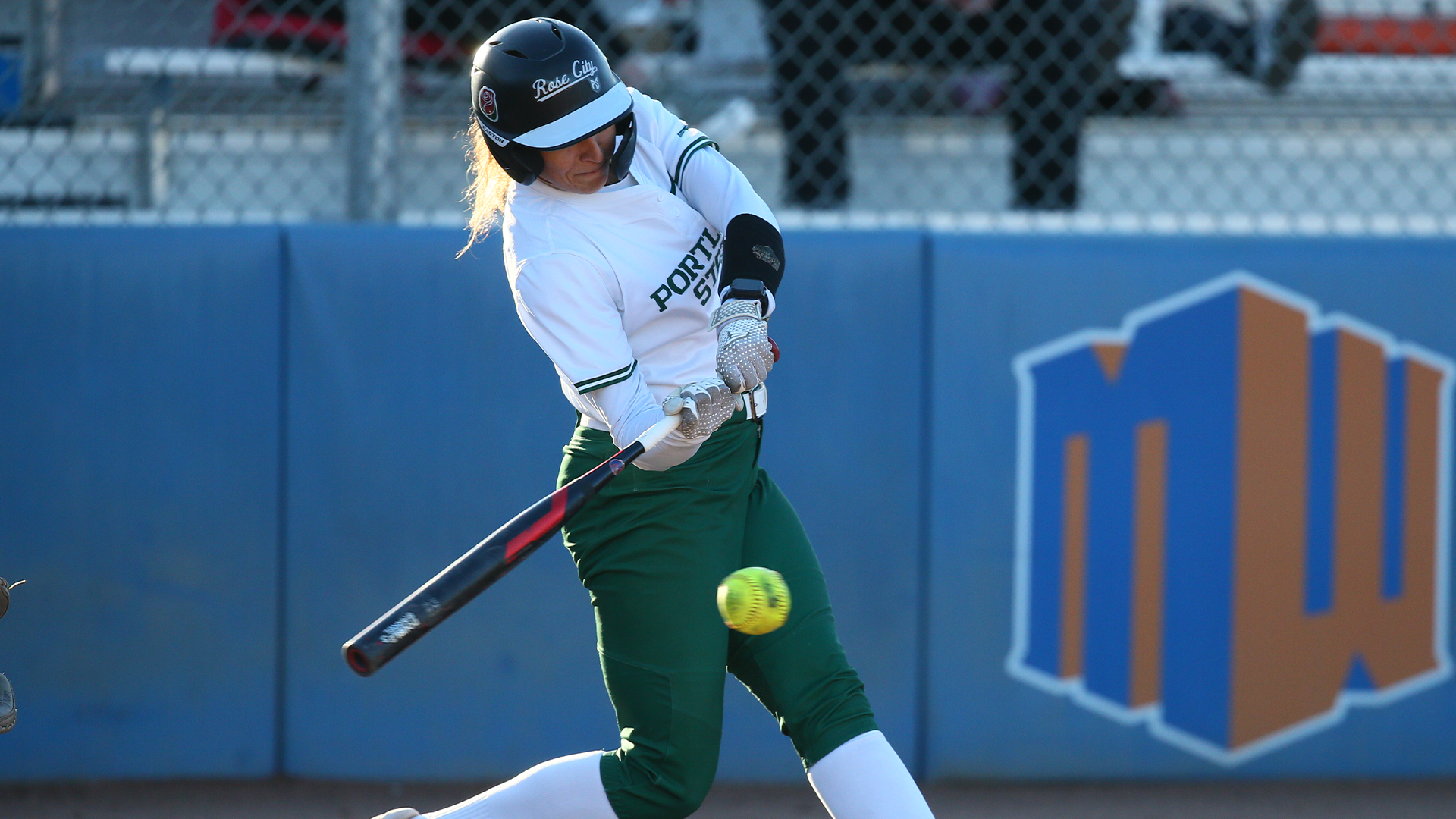 Abigail Carsley swings at a pitch against St. Thomas