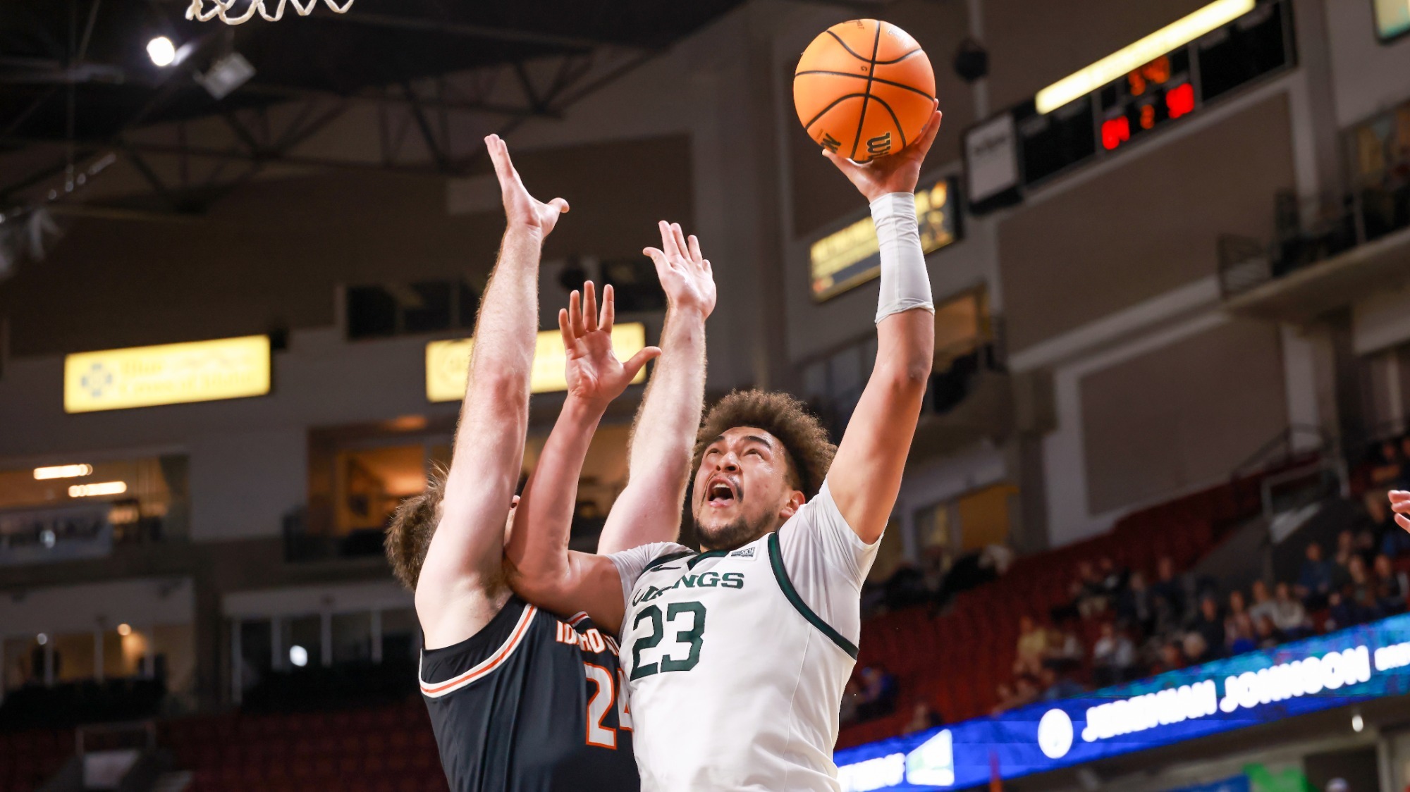 Terri Miller Jr. battles inside for a shot against Idaho State