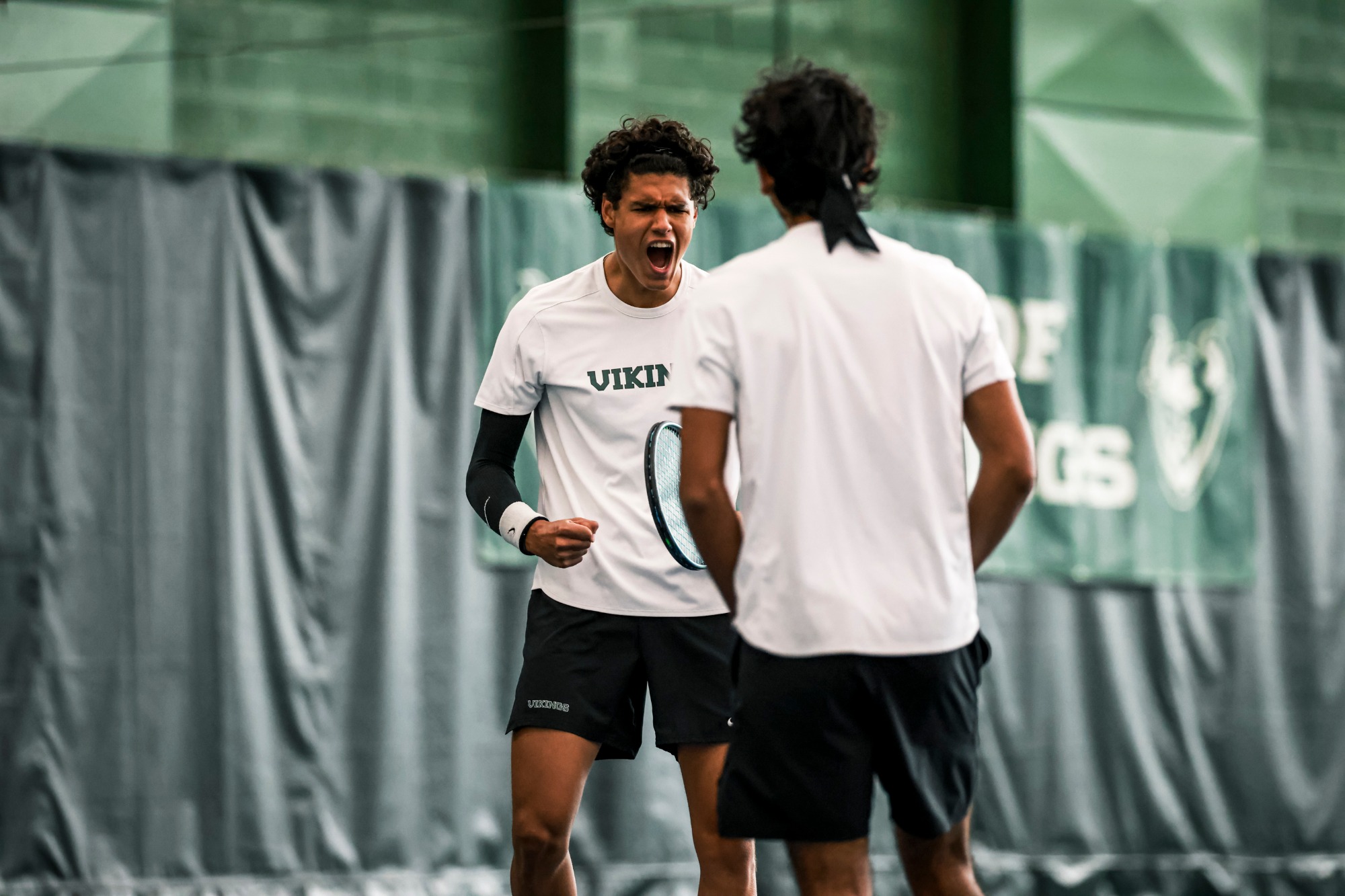 Maas Schotanus and Aarjun Pandit celebrate during a match against the Idaho Vandal on April 5th, 2026.Portland State Mens Tennis vs Idaho : 04/05/2026Final: PSU: 06, UI: 01