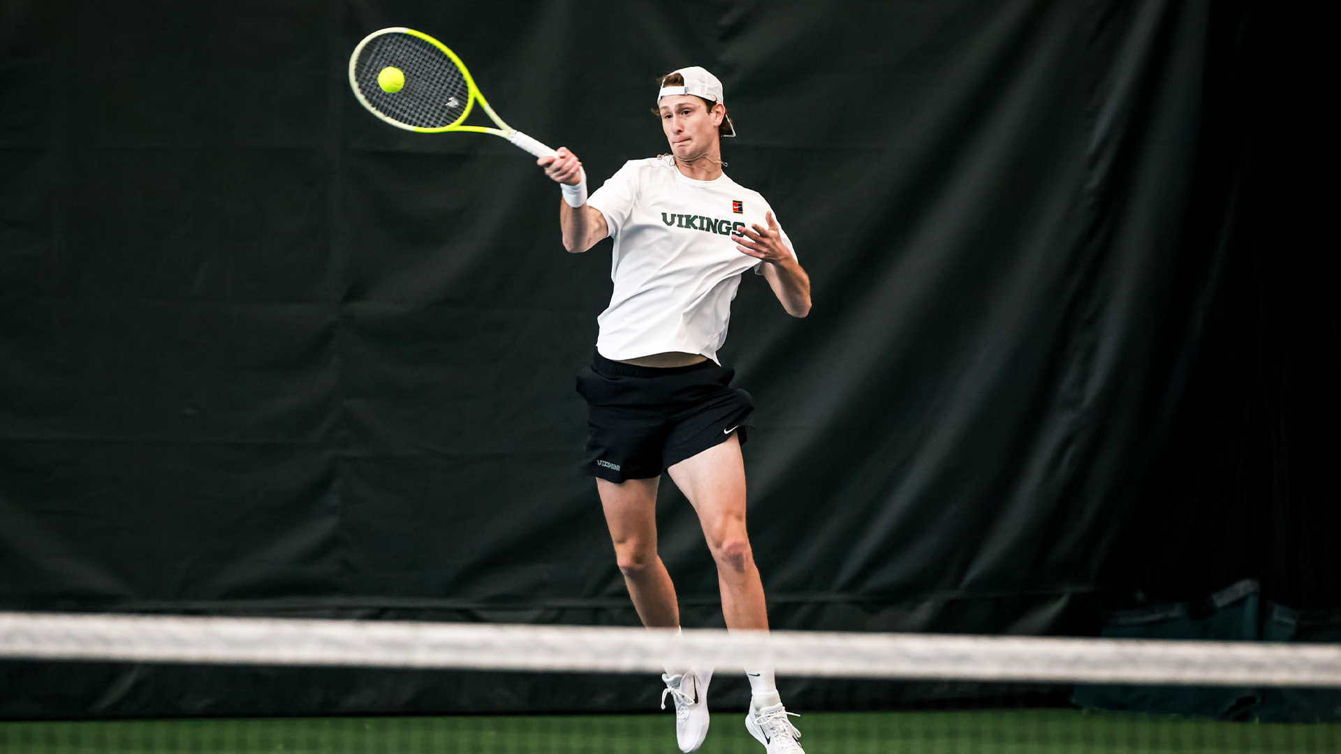 Luca Prino returns a shot vs. Idaho