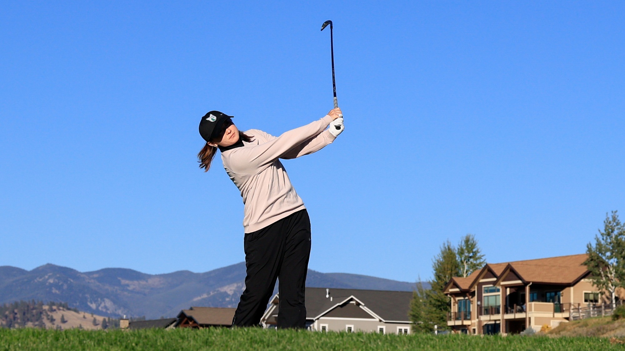 Payten Shimizu hits an iron shot at the Kalispel Invitational