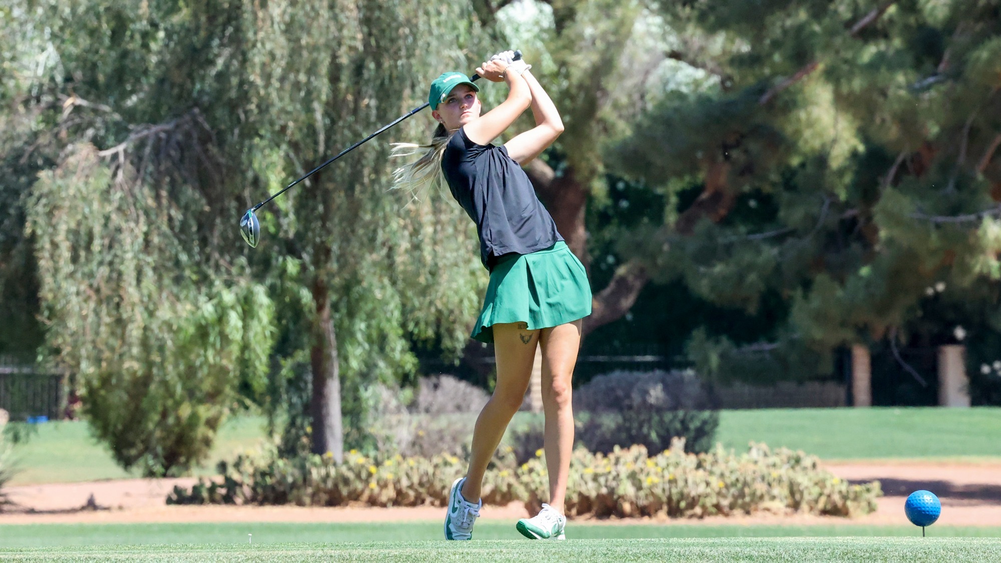 Maddie Dustin tees off on the 18th hole at Wigwam Resort in the Big Sky Conference Championship.