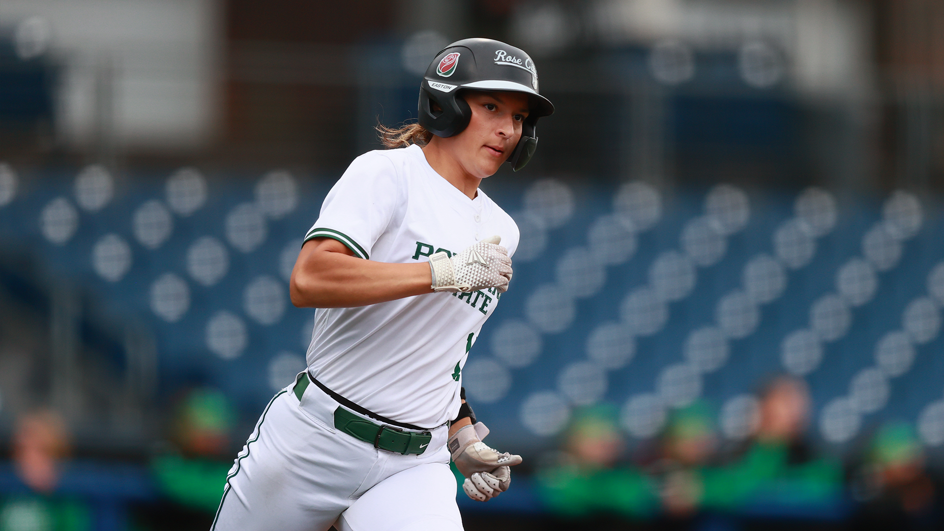 Abigail Carsley running to first base