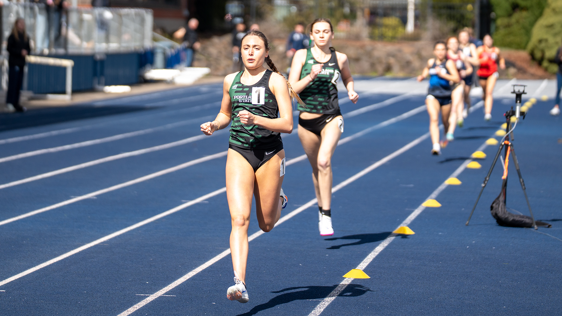 Portland State runner Irina López leads teammate Hannah Butterfield in the 800 Meters at the Rich Allen Classic.