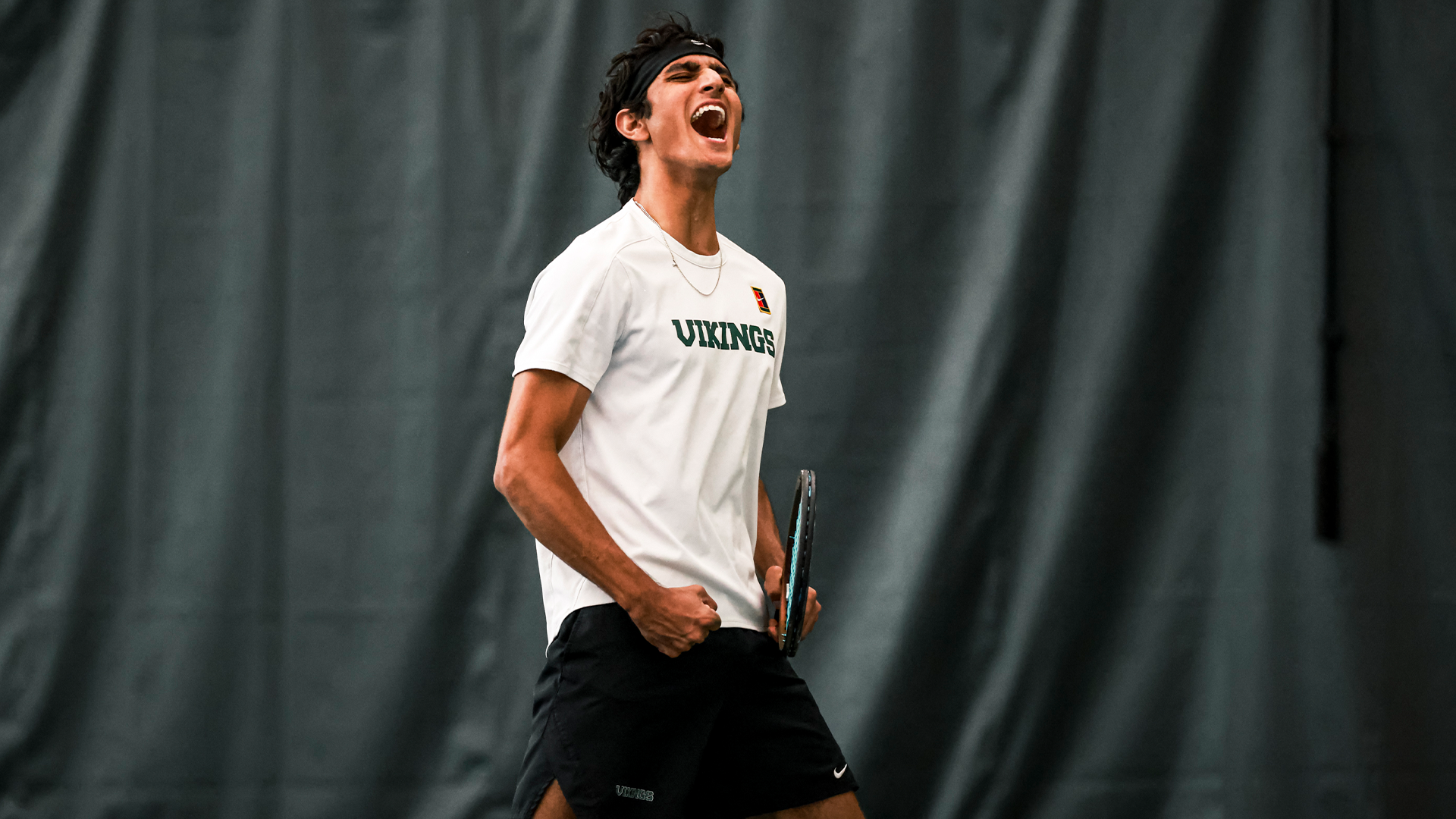 Aarjun Pandit celebrates a point 