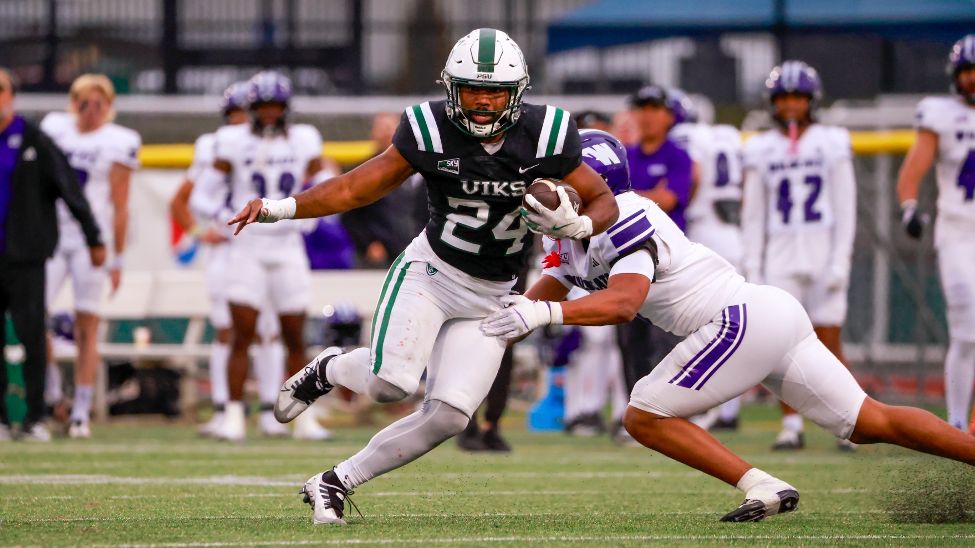 Running back Delon Thompson gains yards against Weber State in a 2025 game
