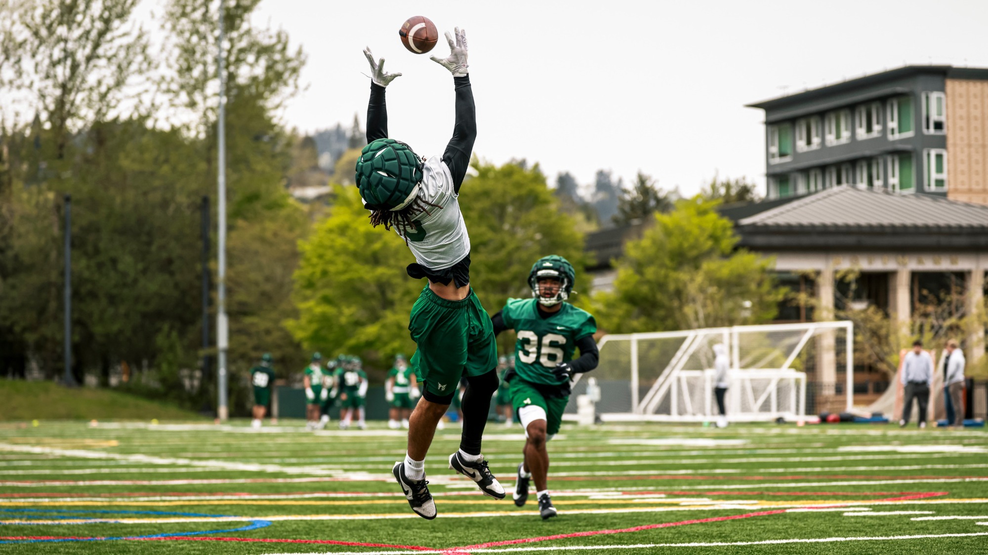 Wide receiver Terence Loville flies high for a reception in a Vikings' 7-on-7 drill.
