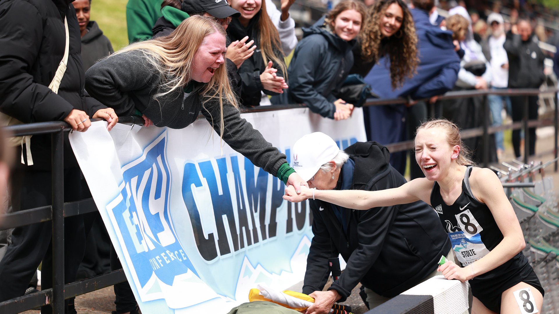 Emma Stolte celebrates with her mom following one of her races at the Big Sky Outdoor Championships