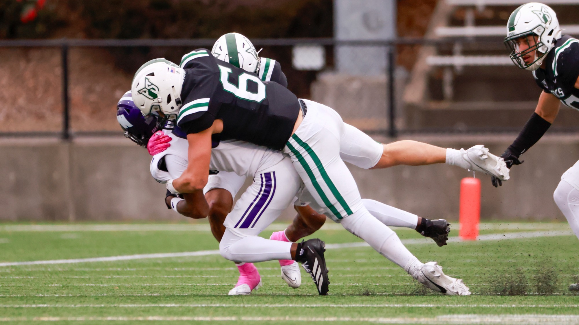 Jaxton Helmstetler makes a tackle against Weber State in a 2025 game