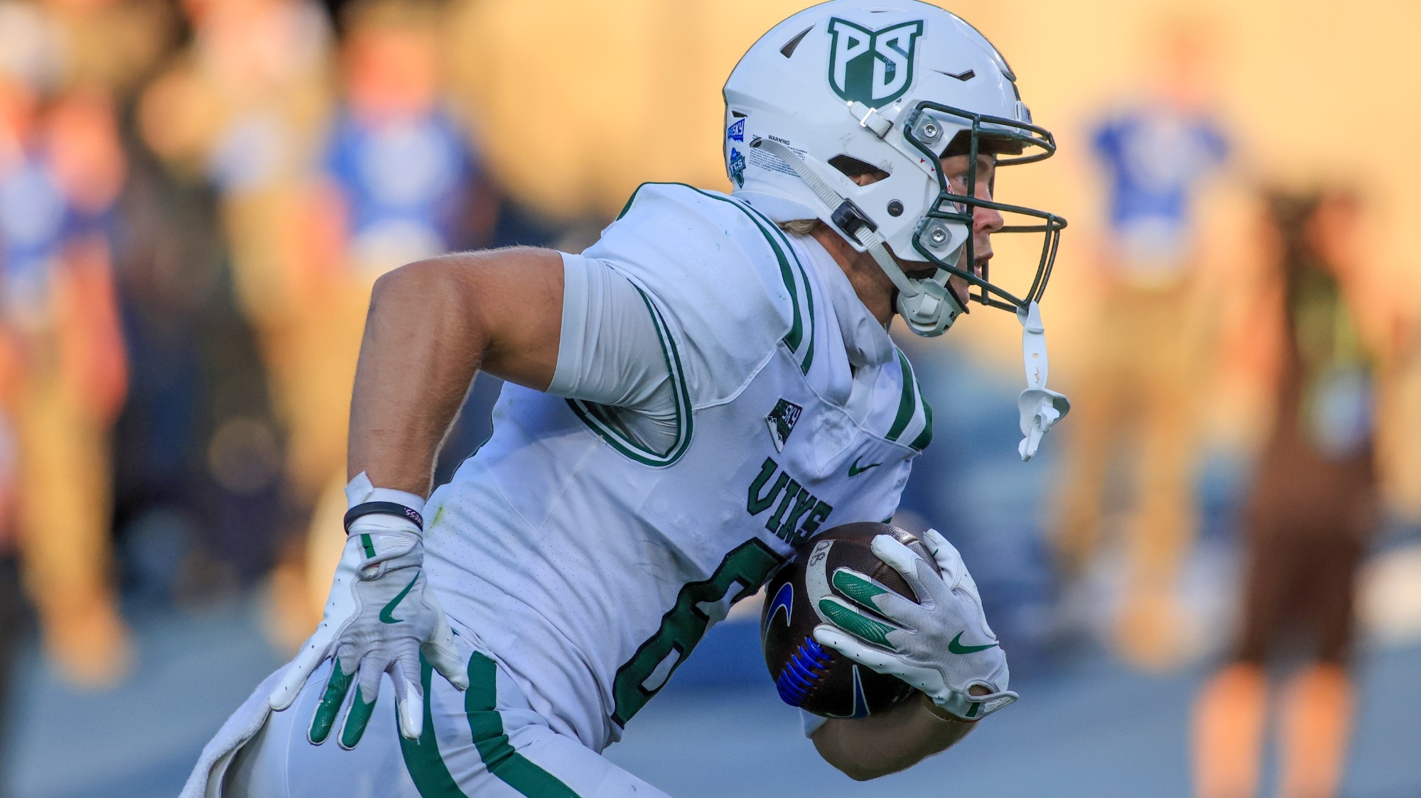 Cru Newman returns a kickoff during a 2025 game against BYU
