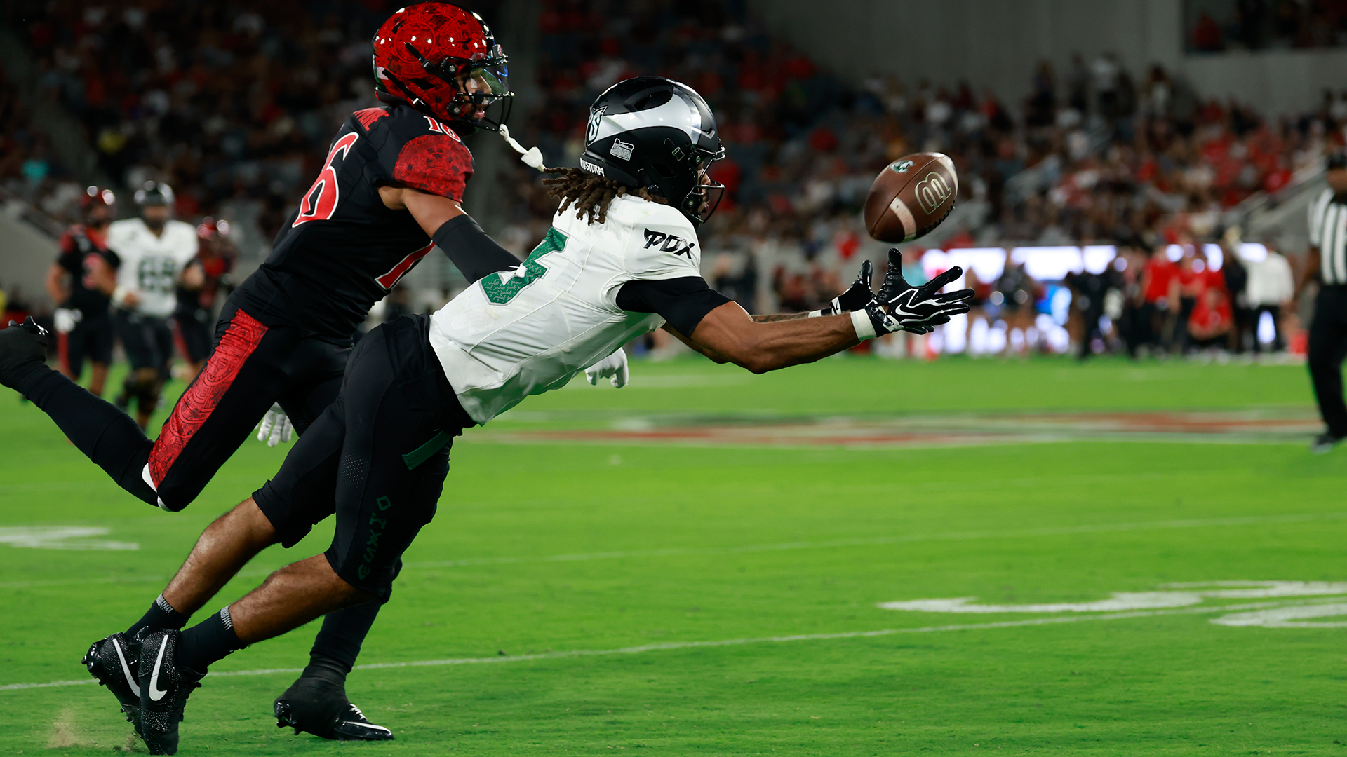Portland State football player Terence Loville dives out for a reception during the Vikings' road game at San Diego State.