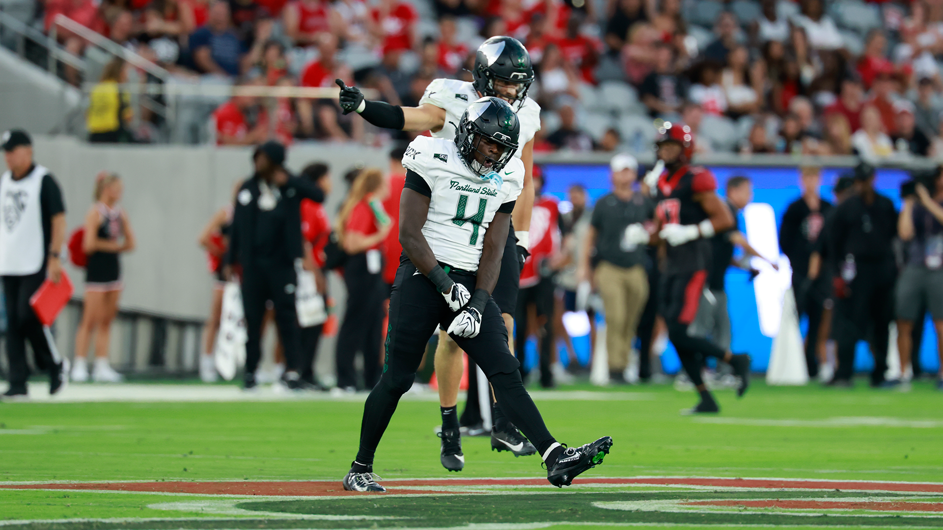 Portland State football player Isaac Redford celebrates after intercepting a pass during the Vikings' game at San Diego State