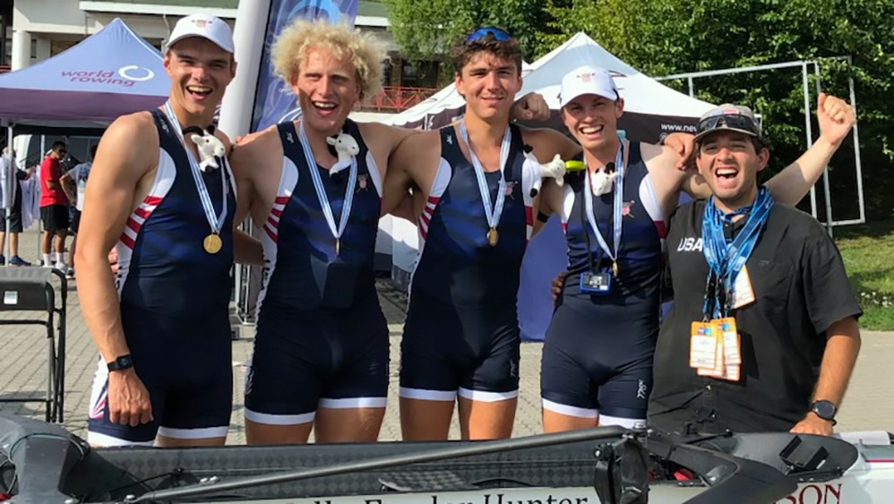 Sam Sullivan (second from left) wins gold in men's 4+ at 2025 World Rowing U23 Championships in Poznan, Poland