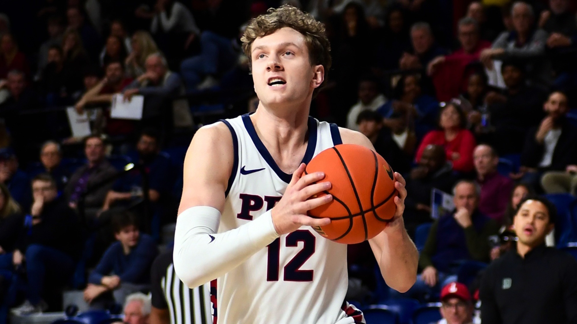 TJ Power heads in for a dunk vs. Dartmouth 2-27-2026
