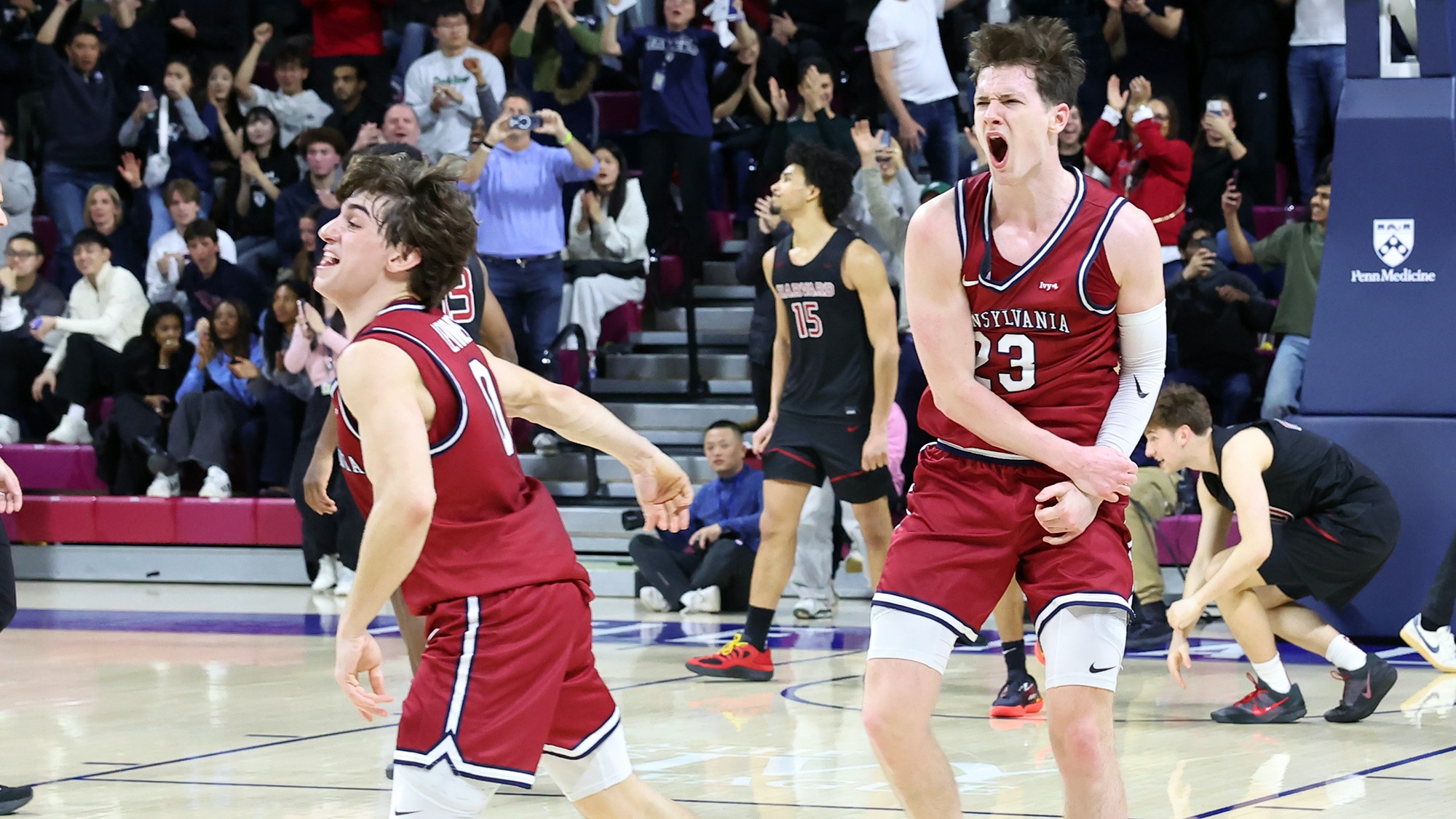 AJ Levine and Ethan Roberts celebrate after beating Harvard on Senior Night 2-28-2026