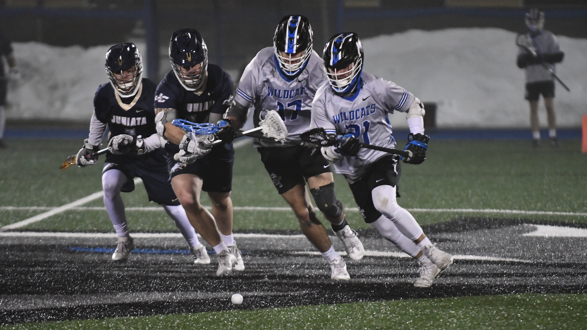 Penn College men's lacrosse player in action during a game against Juniata