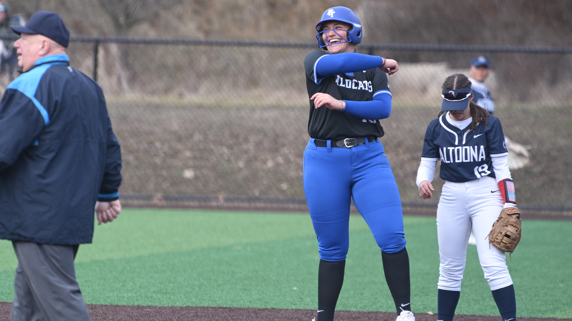 Penn College softball player celebrating a hit