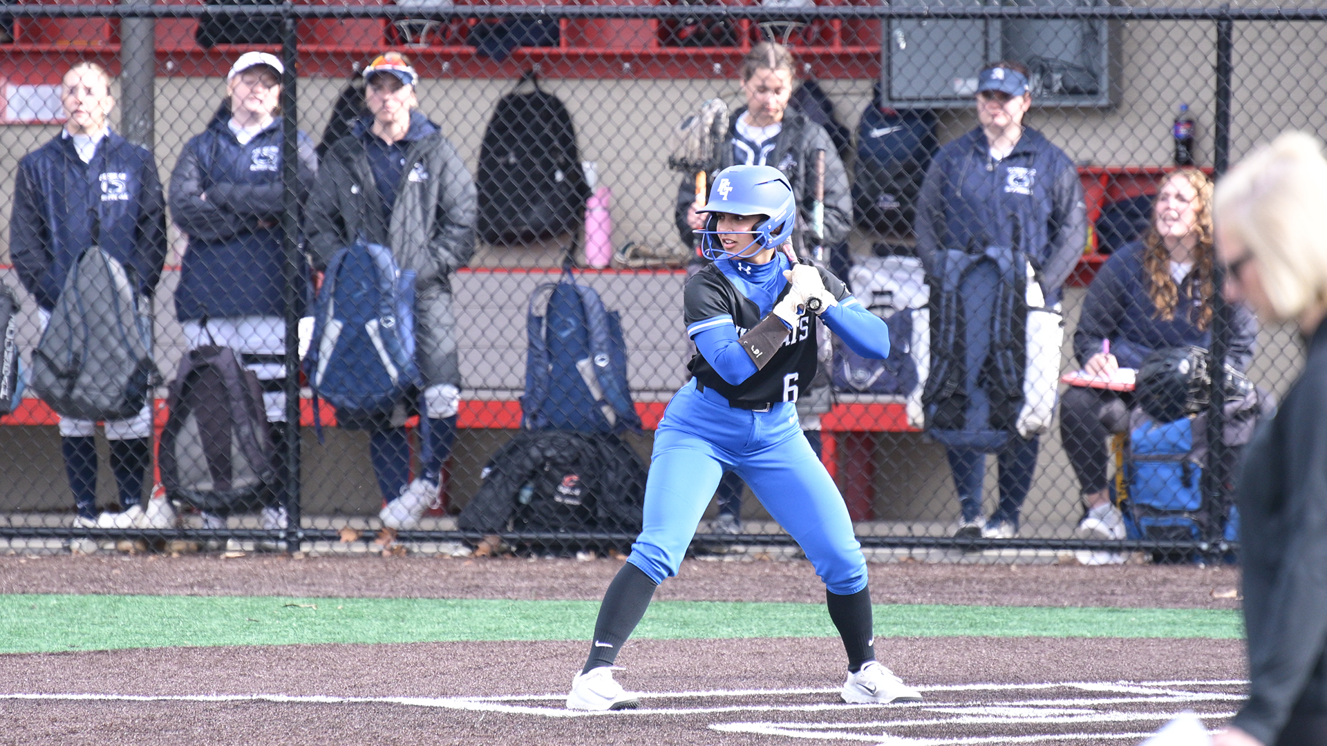 Penn College softball player preparing to hit