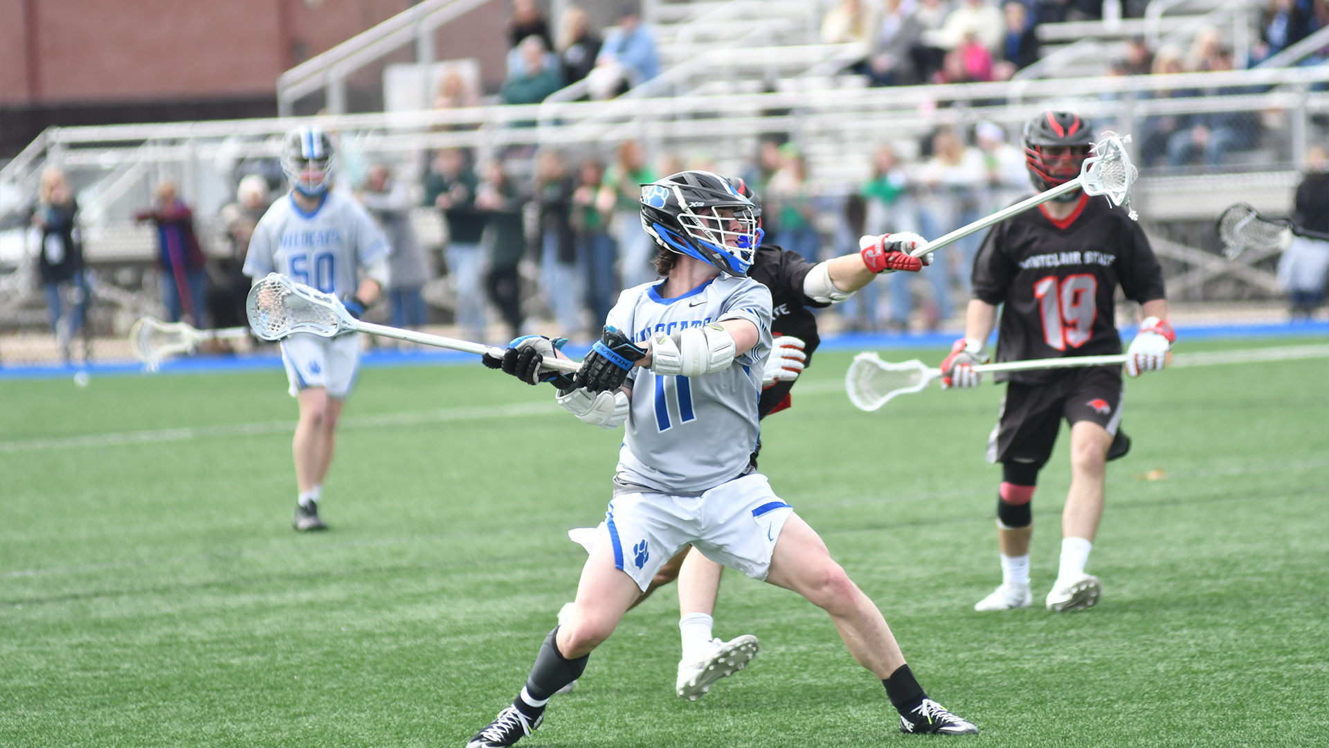 Penn College lacrosse player in action during a game 