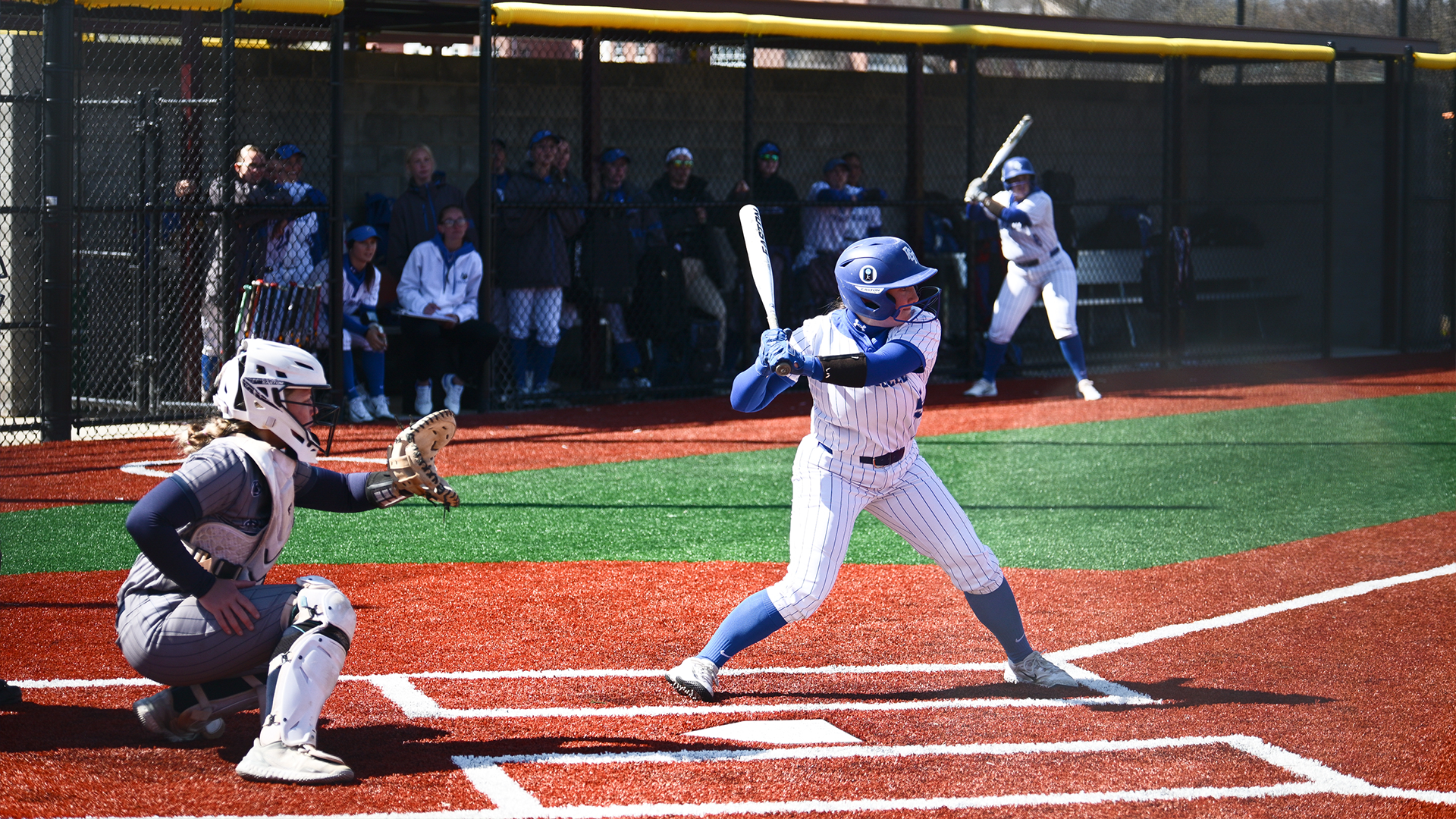 Penn College softball player in action during a doubleheader against Penn State Abington