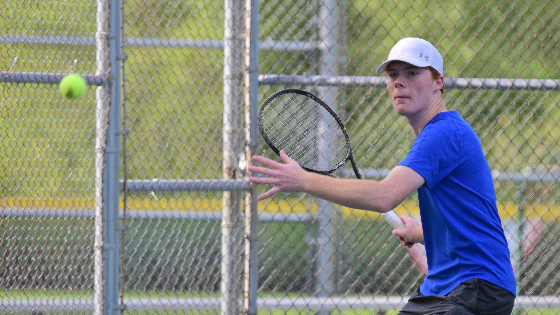 Penn College men's tennis student-athlete playing a match at Lycoming College