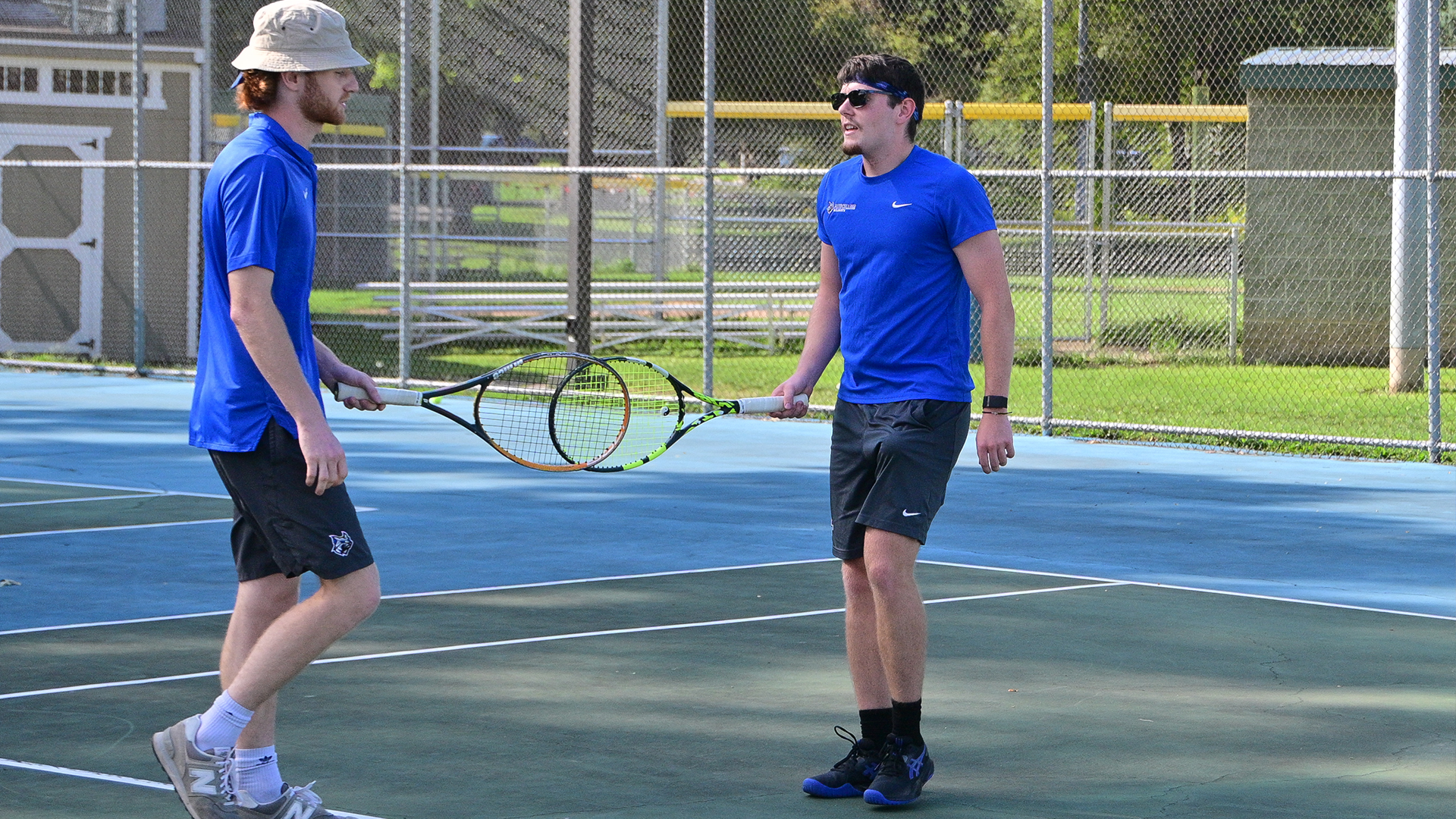 Penn College men's tennis student-athlete playing a match at Lycoming College