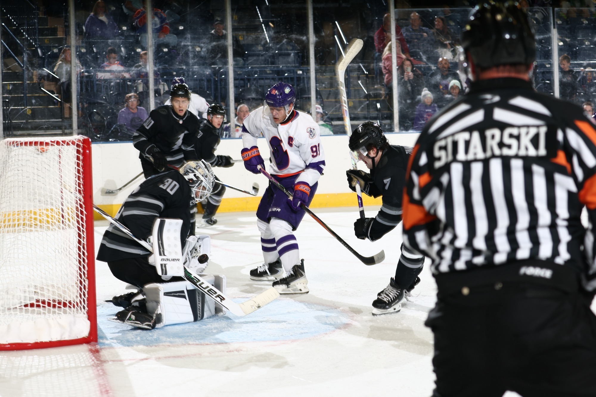 SAMUEL HRENAK STOPS A SHOT FROM PHANTOMS CAPTAIN MALACHI MCKINNON