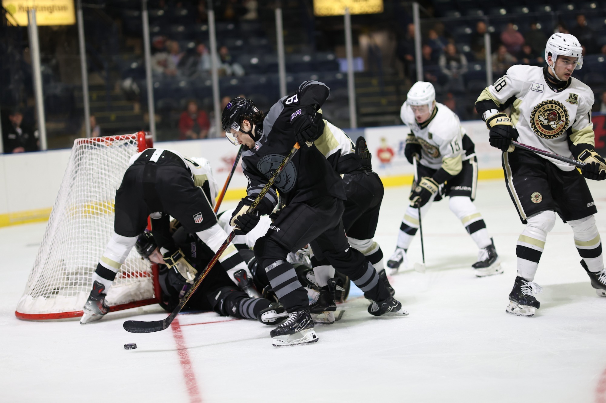A SCRUM BY THE MUSKEGON NET