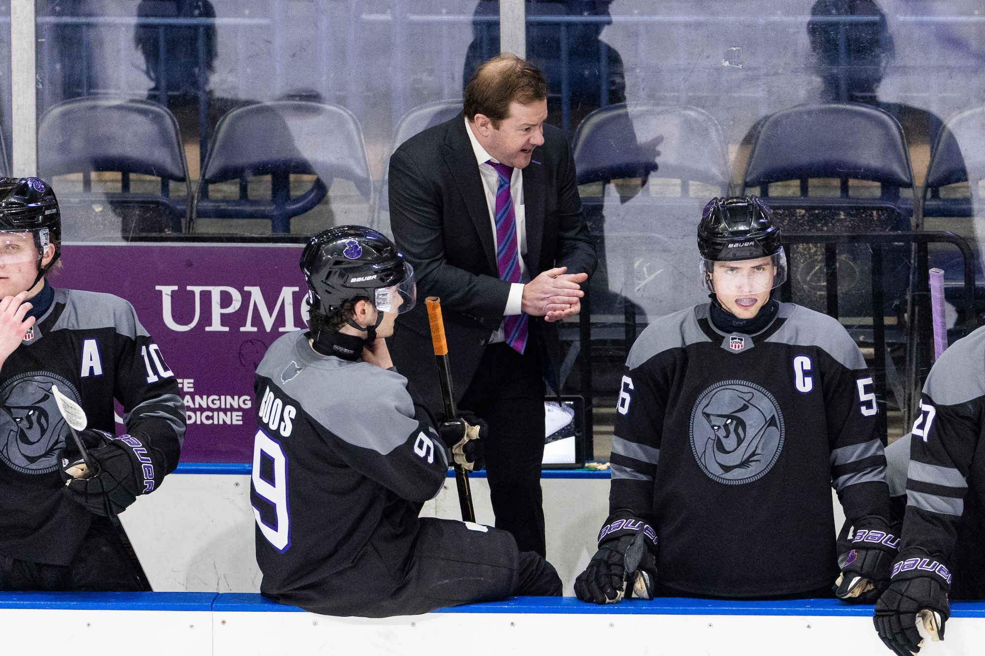 HEAD COACH RYAN WARD GIVES DIRECTION TO HIS TEAM FROM THE BENCH