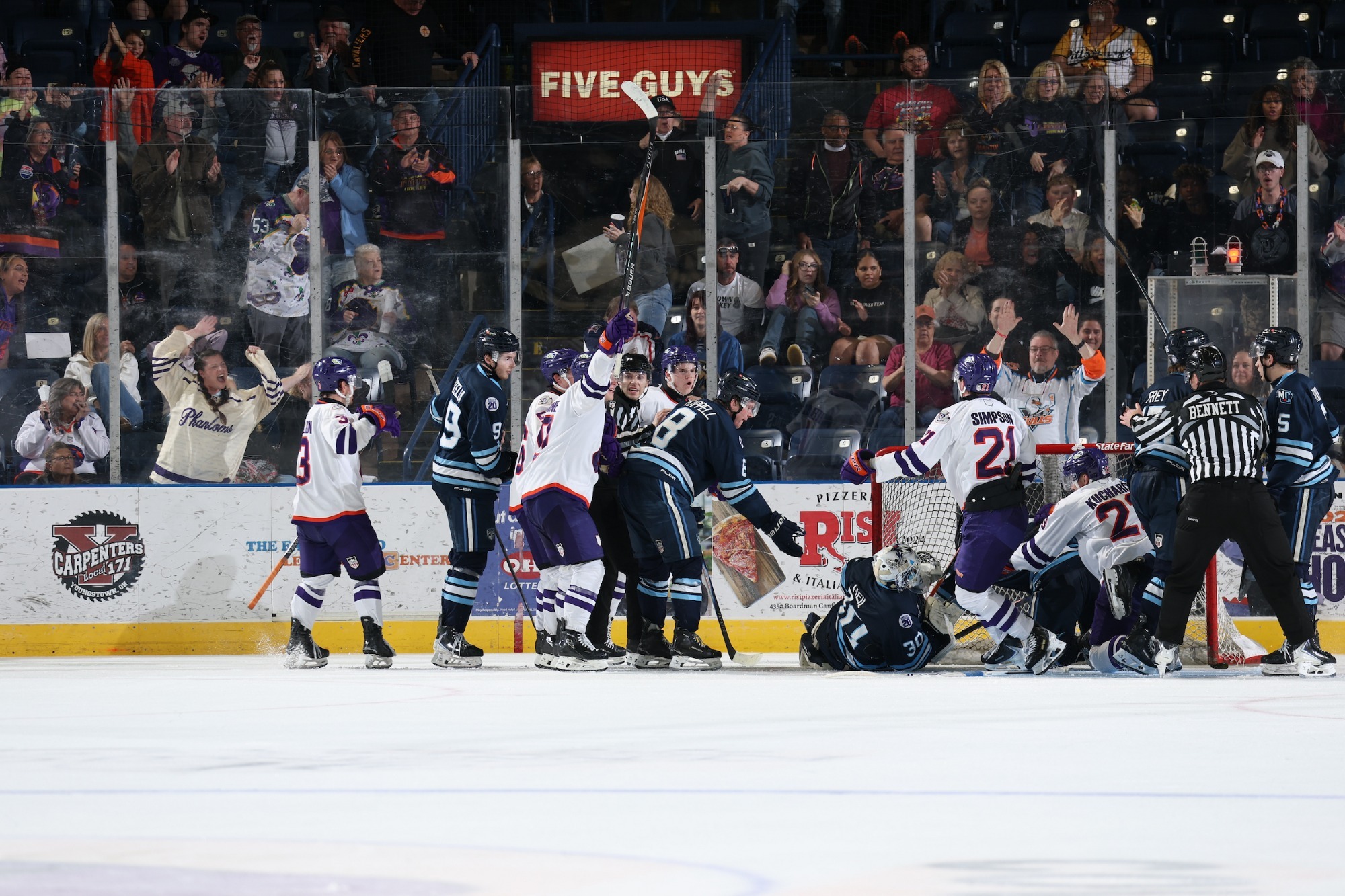 THE YOUNGSTOWN PHANTOMS CELEBRATE THEIR THIRD PERIOD GOAL AGAINST THE MADISON CAPITOLS