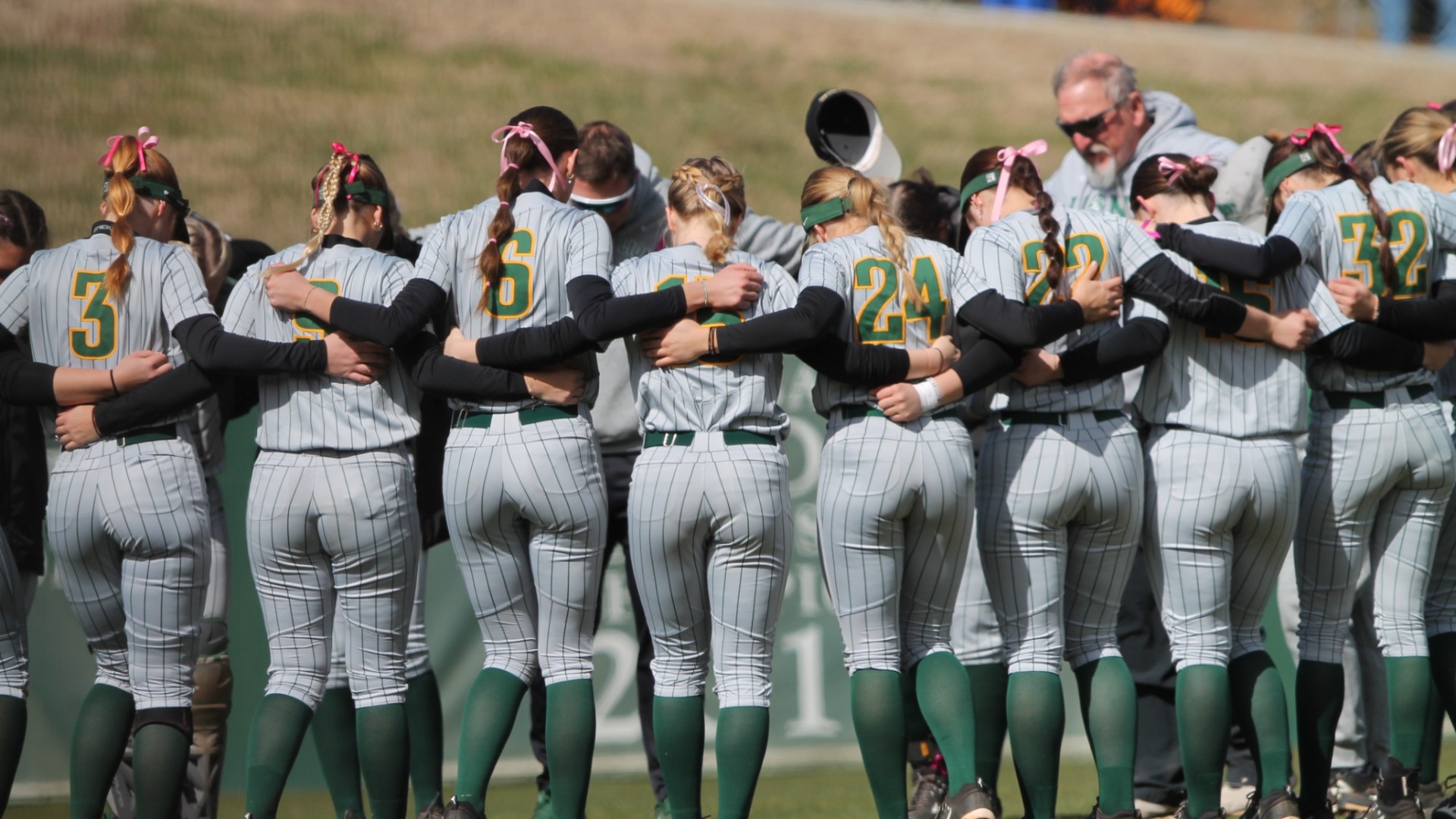 Softball Team Huddle 2024