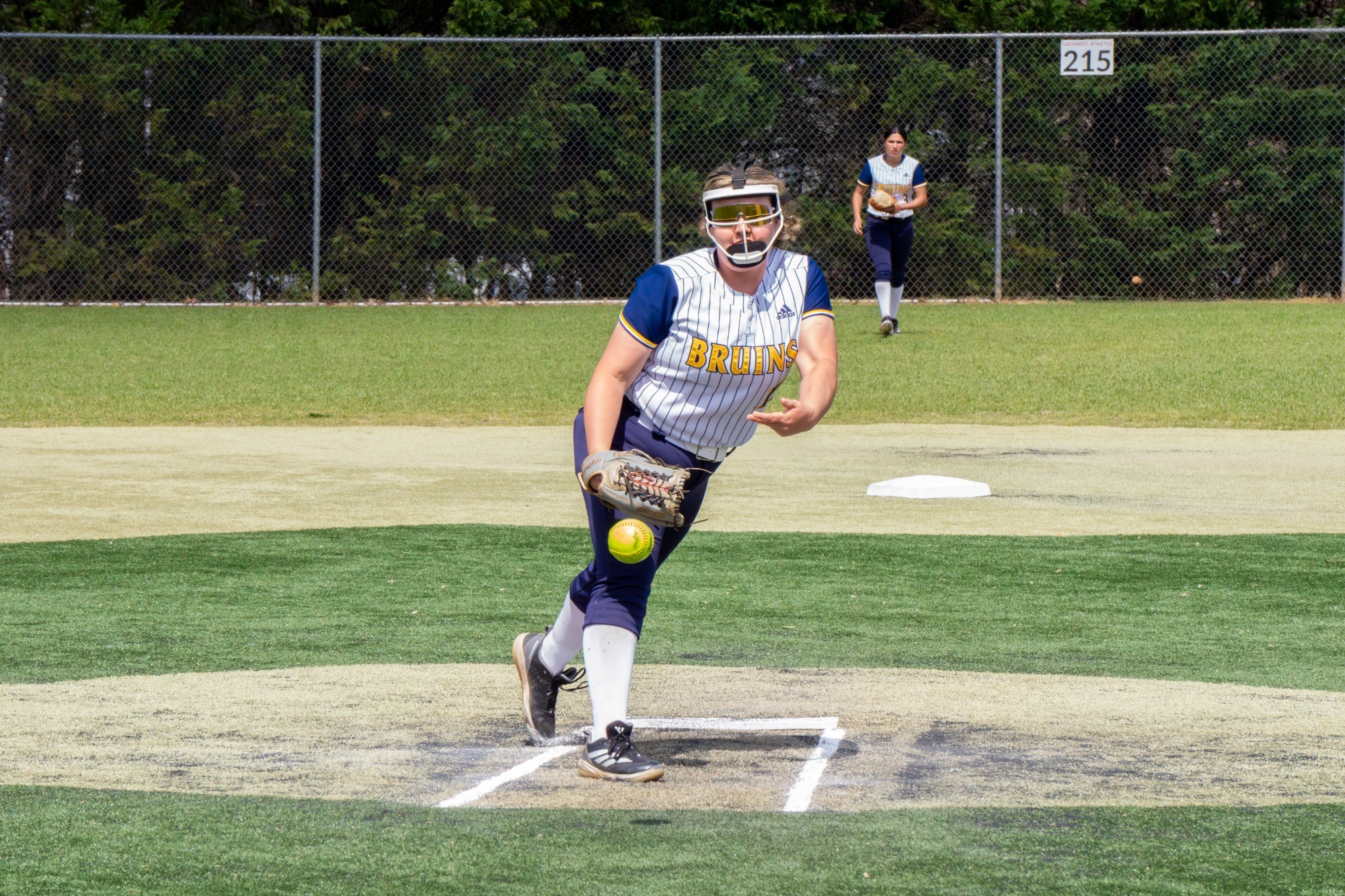 Madison Hamilton pitching the ball