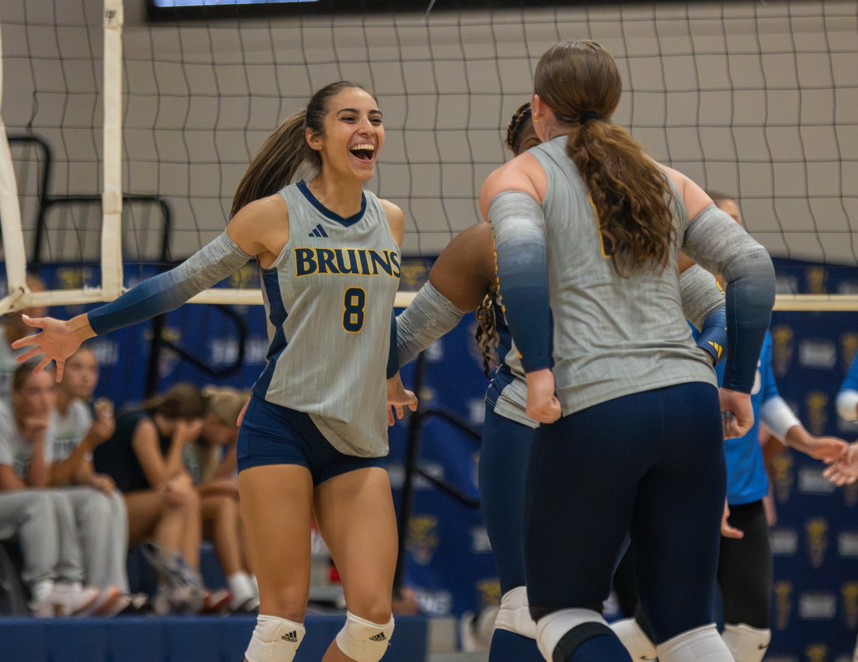 Britney Comolli celebrating after point