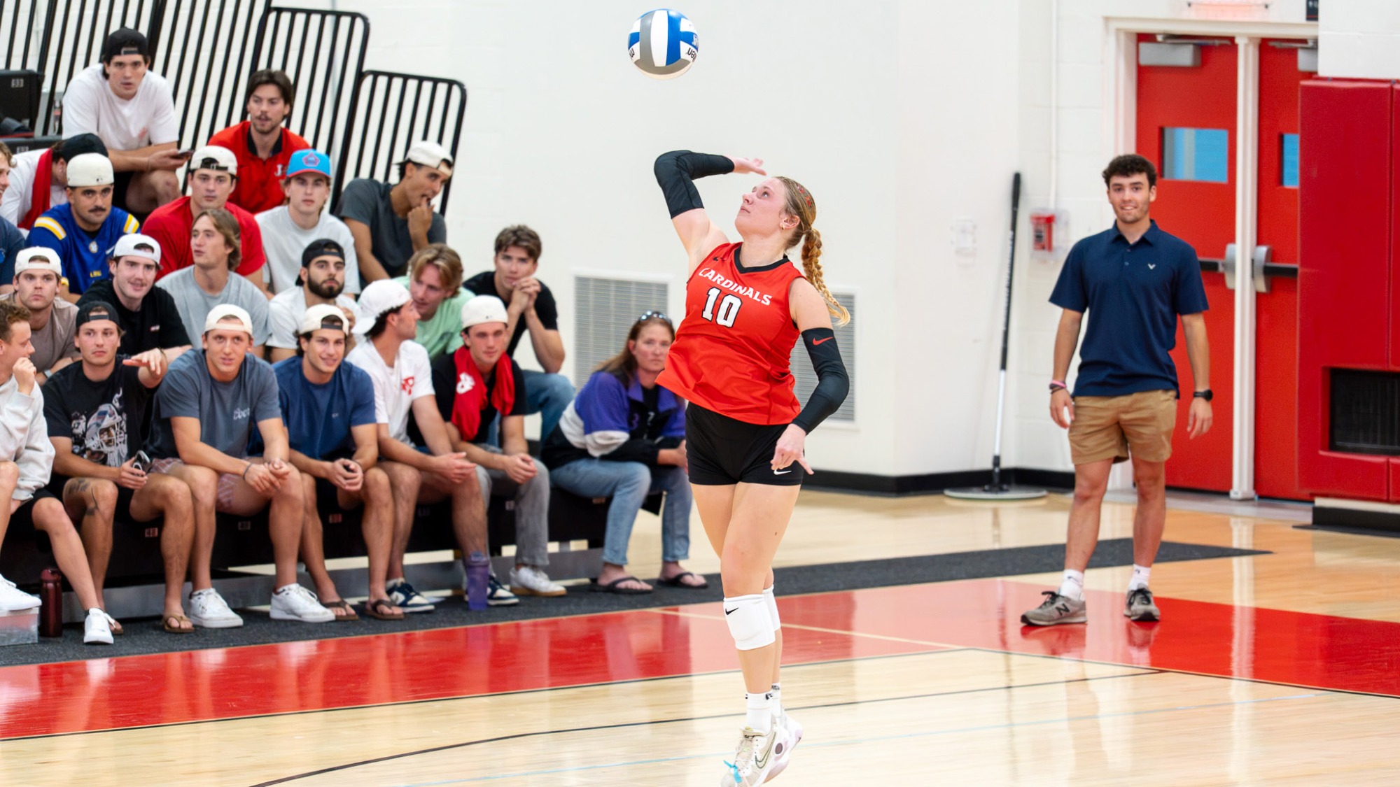 Iris Mulvey Serving Volleyball