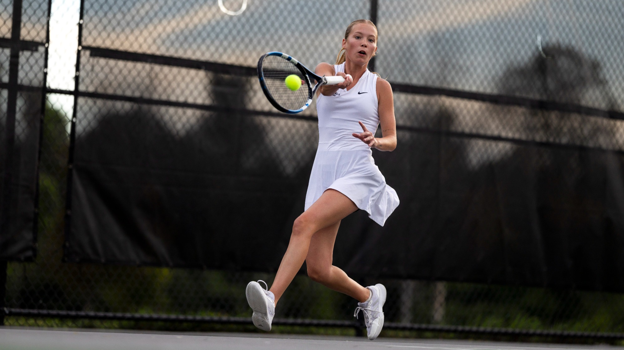 Jacklin Mitchell Hitting Tennis Ball