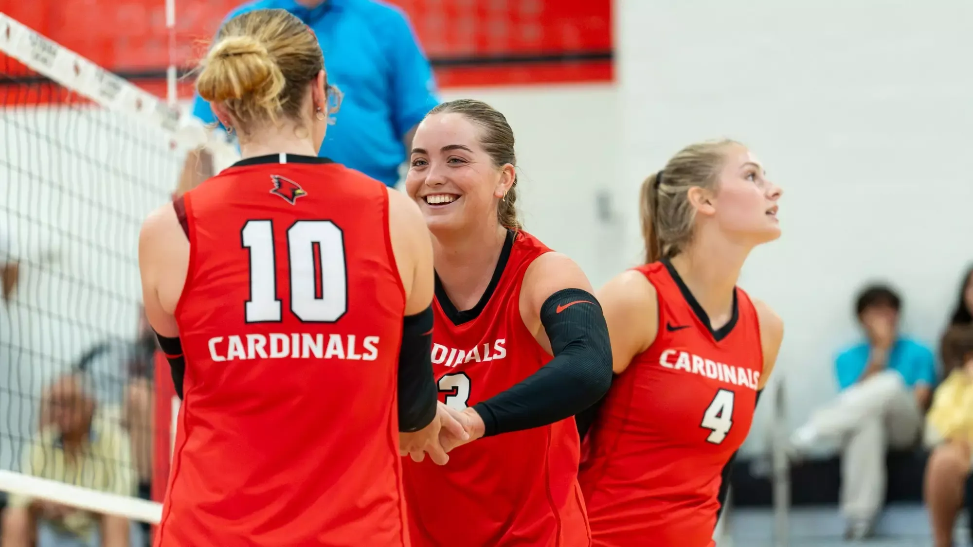 Emily O'Brien high fiving Iris Mulvey
