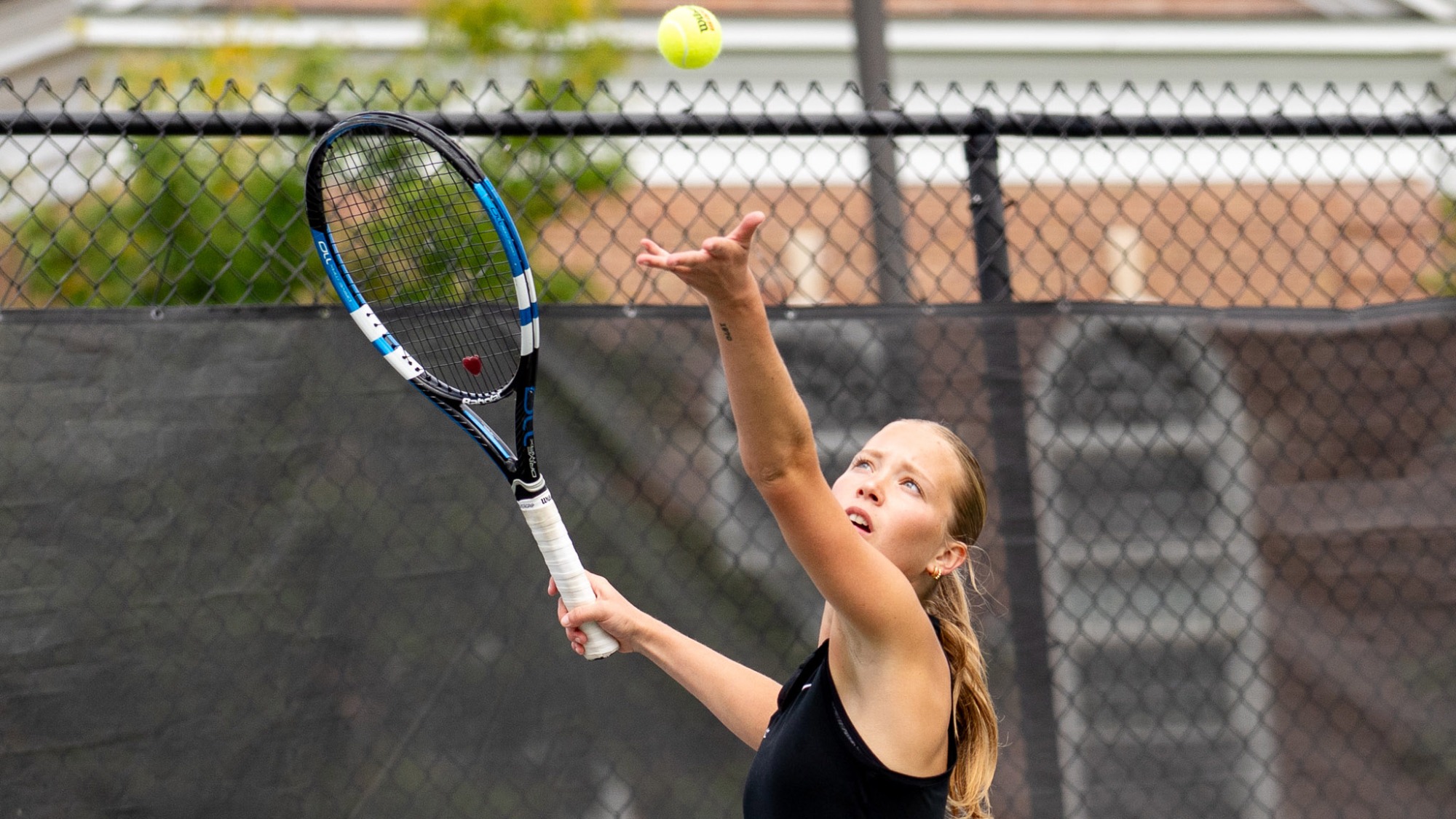 Jacklin Mitchell hitting a tennis ball
