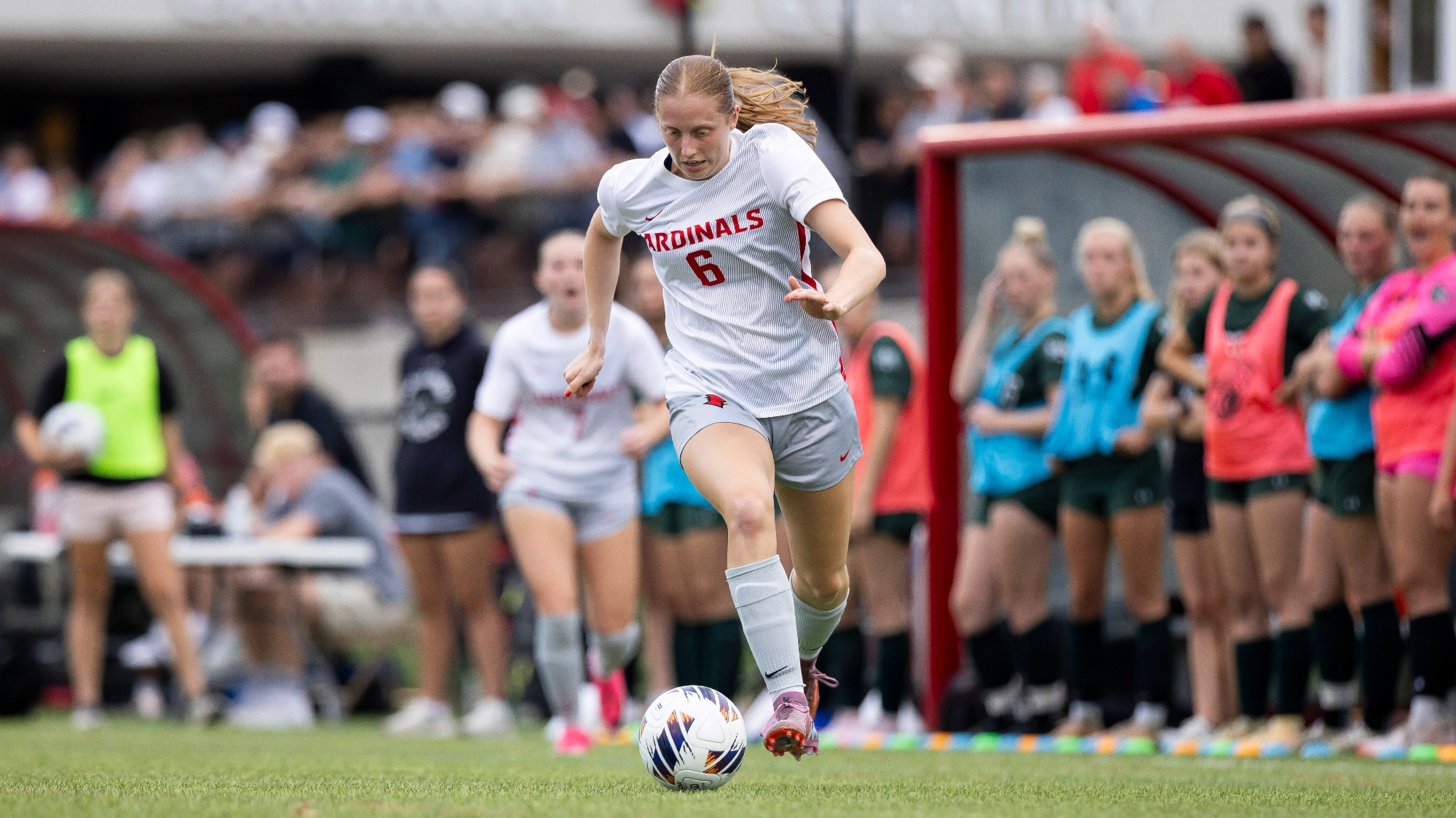 Kyra Whitman dribbling the ball